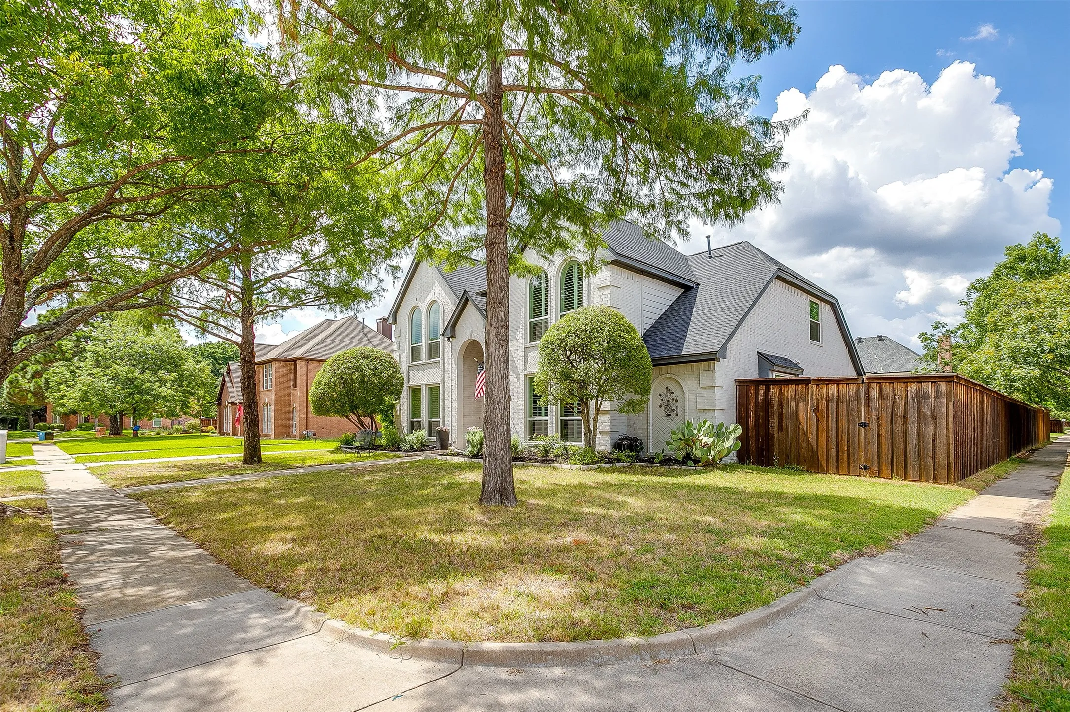Beautiful corner lot with mature trees.