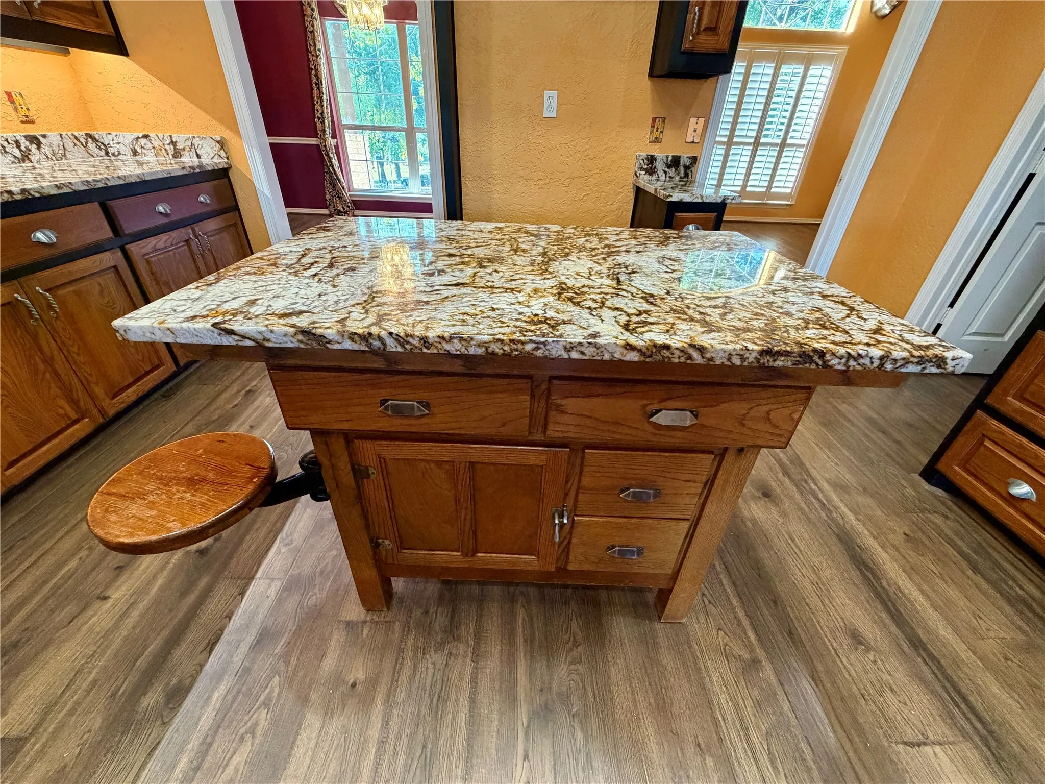 Island in kitchen is removable, also has an attached stool