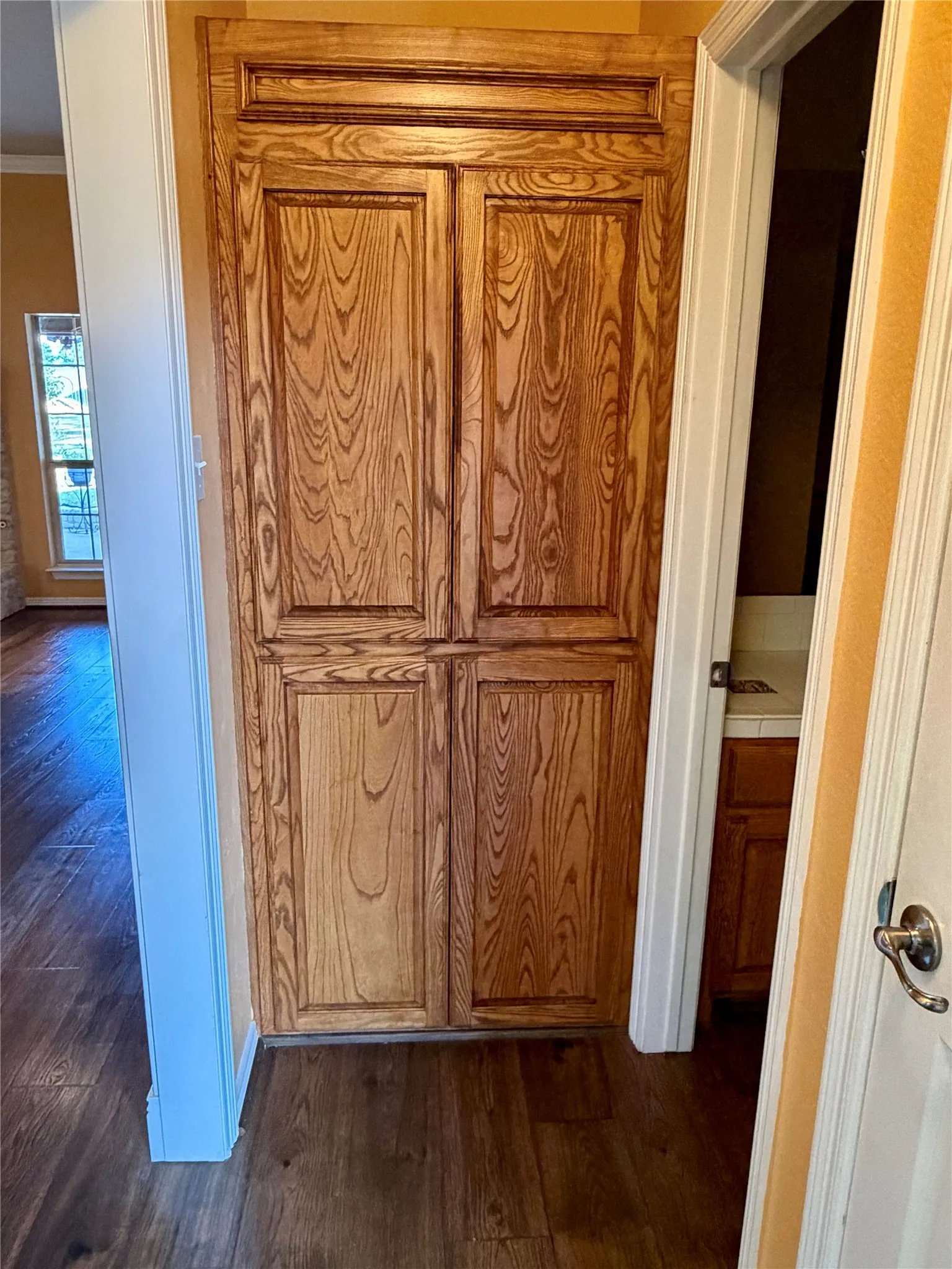 Solide wood cabinetry in the hallway