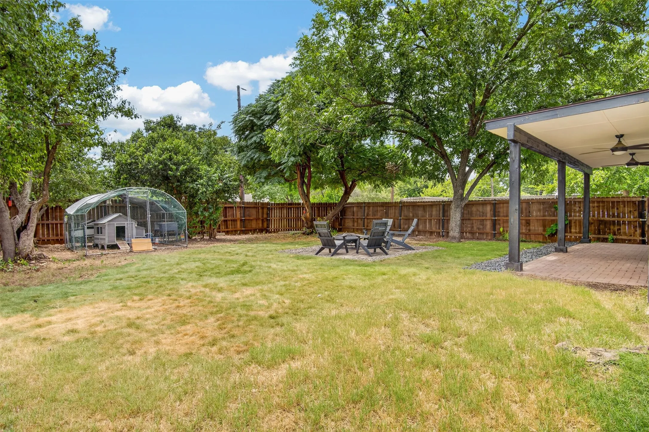Yard has chicken coop.