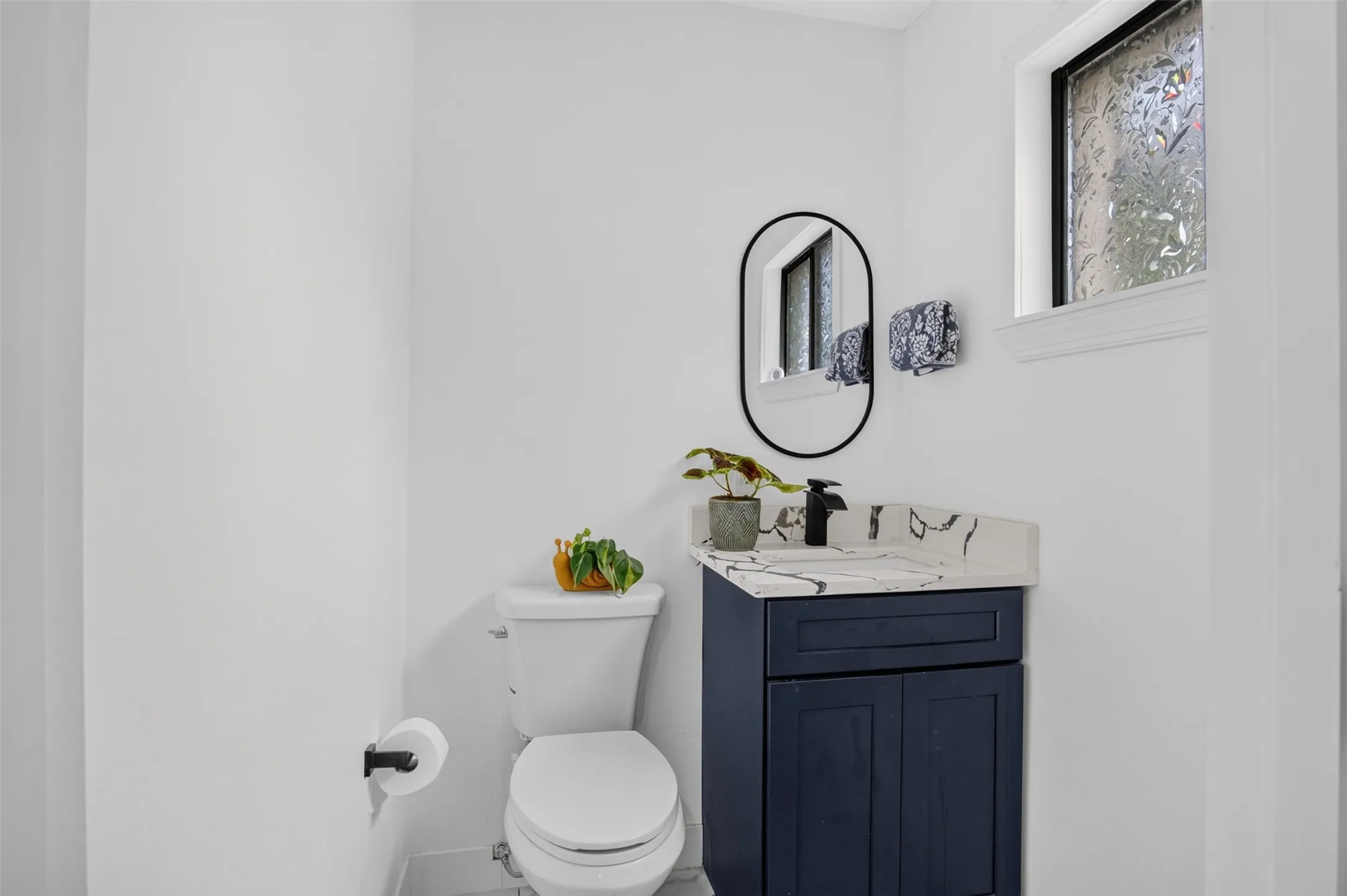 Half bathroom downstairs.