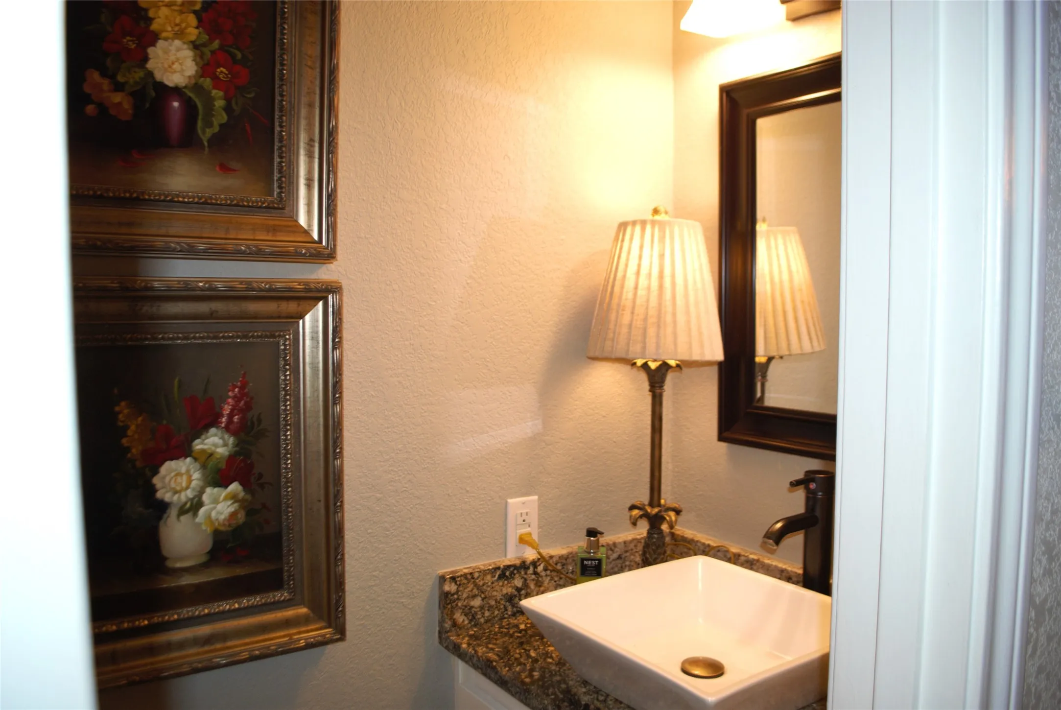 Downstairs Half-Bathroom with vanity