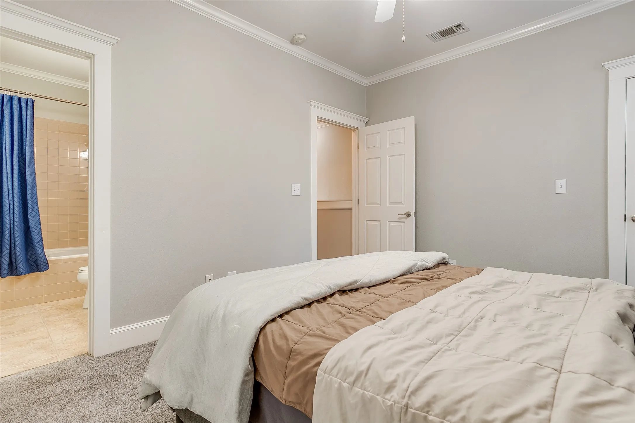 Neutral tone wall color with white trim