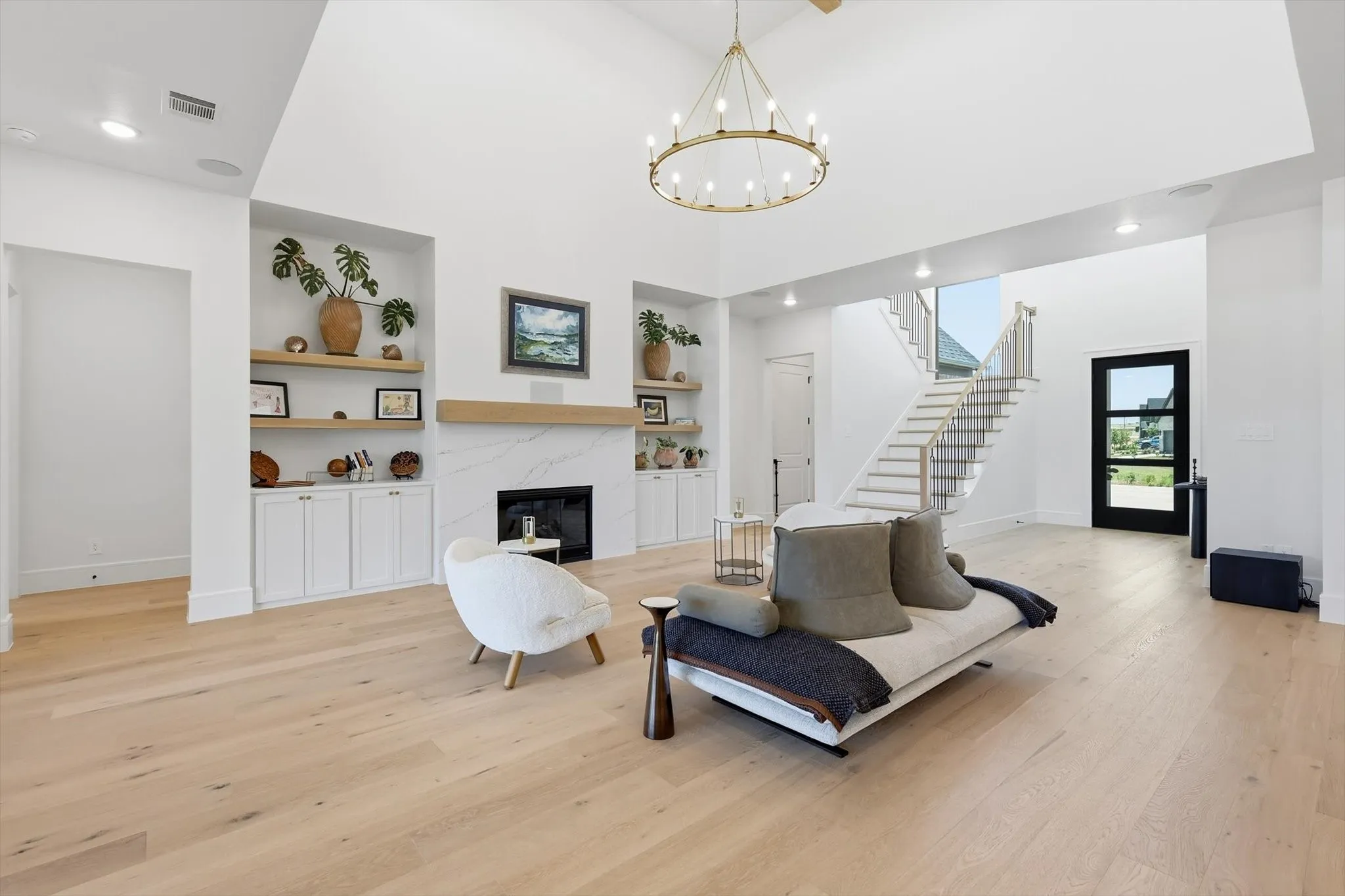 Another view of the living area with a stunning architectural ceiling.