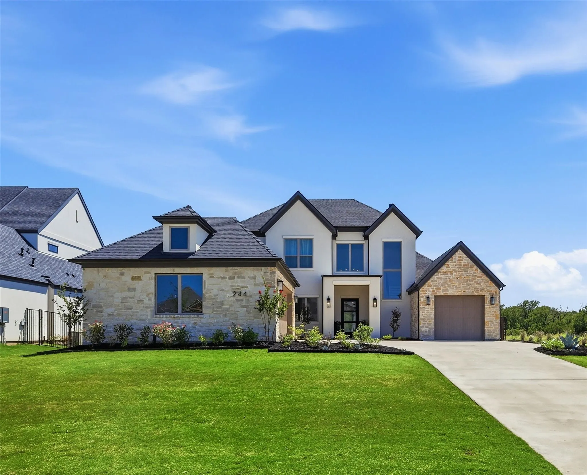 Stucco and rock exterior add to this beautiful exterior