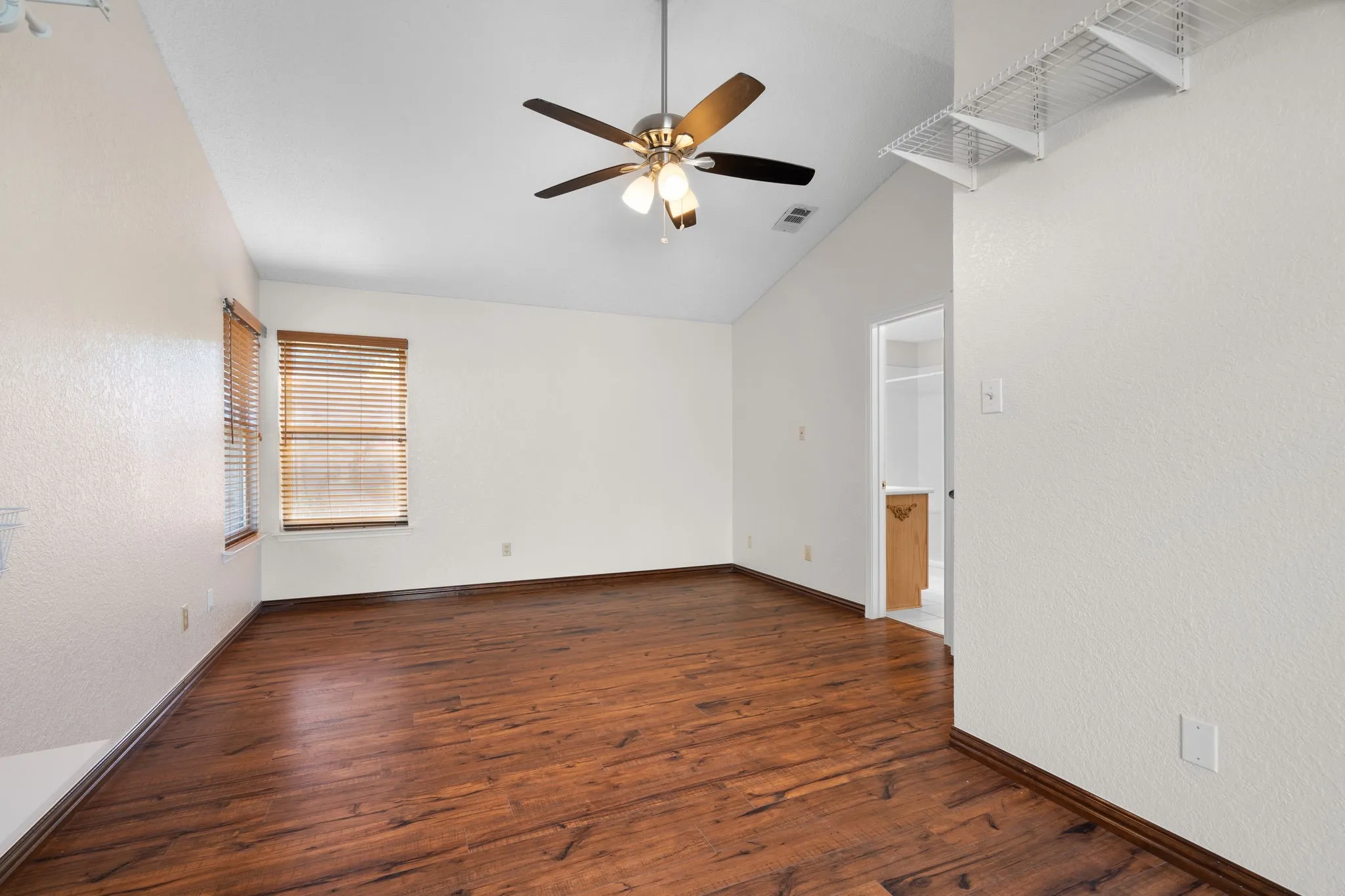 Another view of the primary bedroom.
