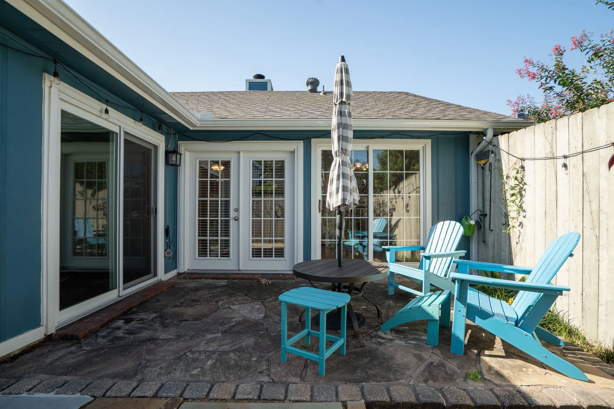 The private patio is accessible from the primary bedroom and the living area.