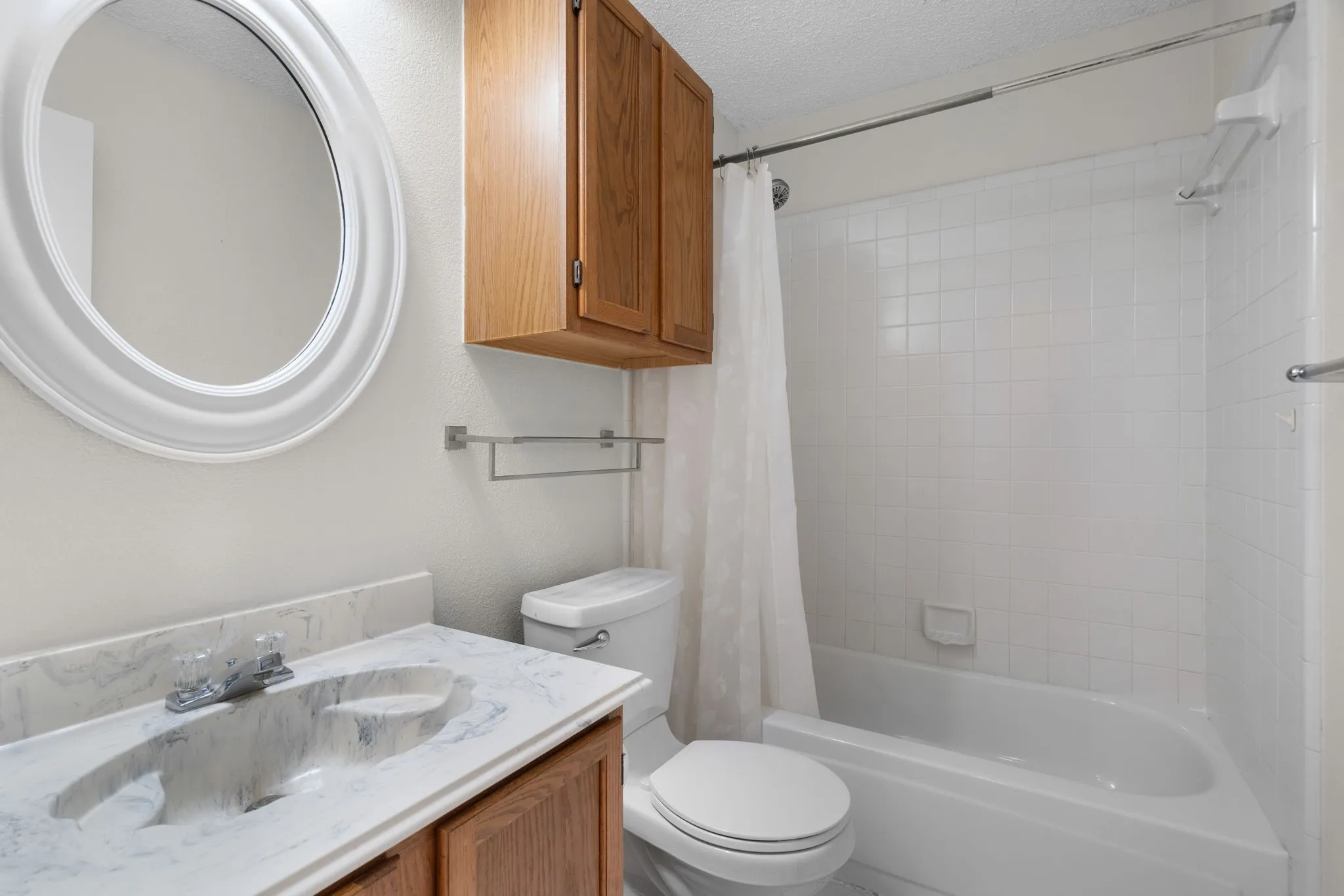 The guest bath is located between the two secondary bedrooms.