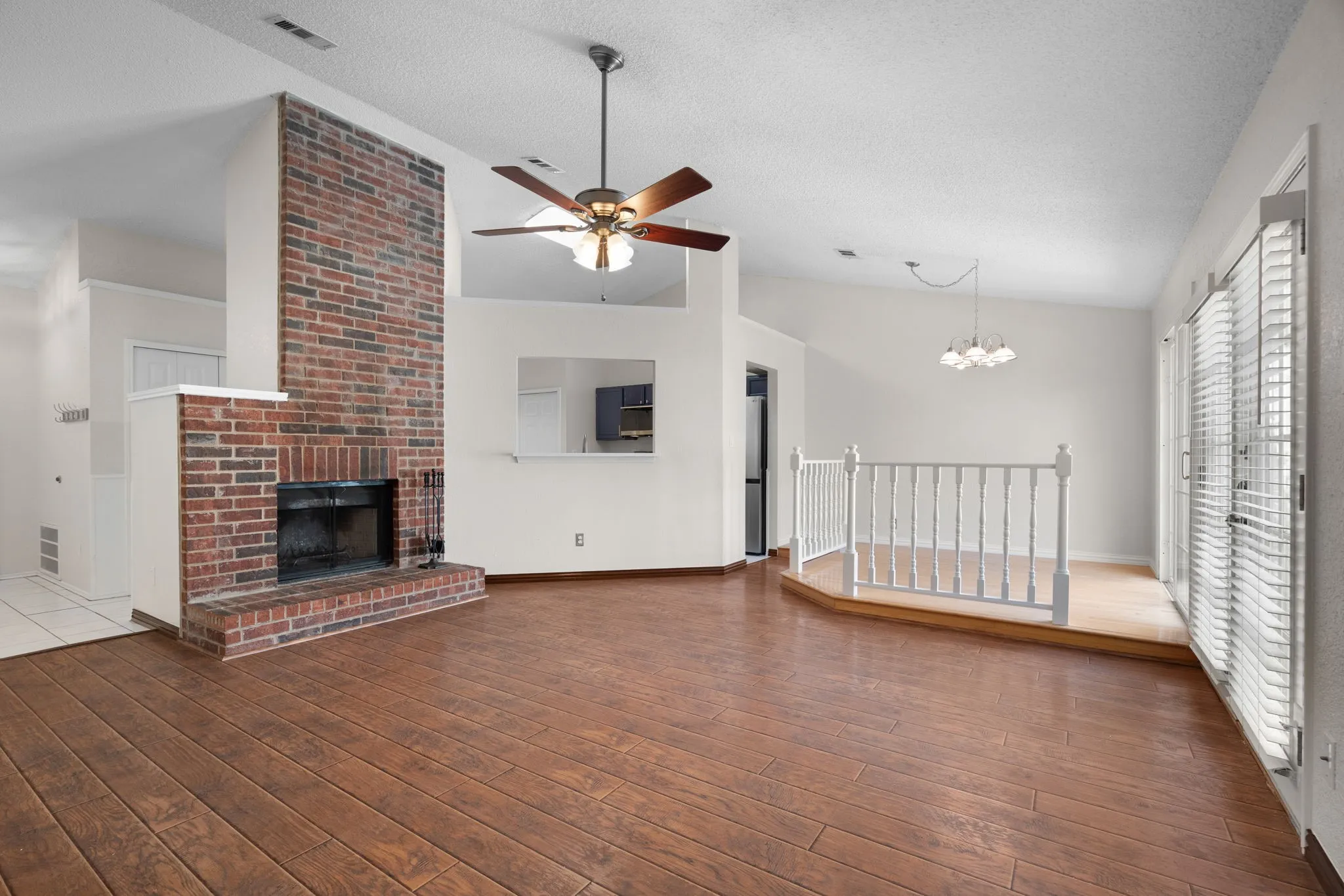 The living room is open to the dining area and the kitchen.