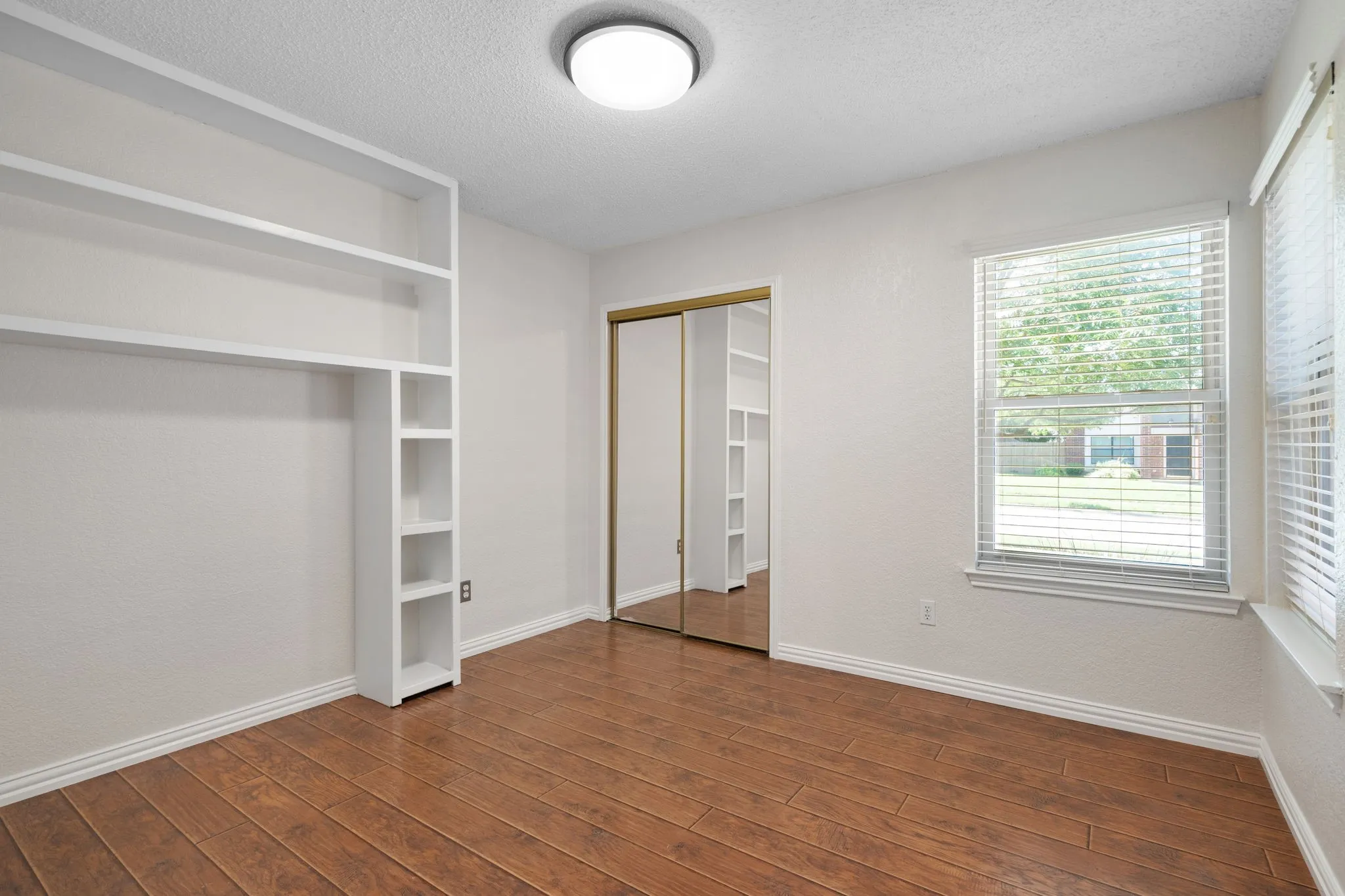 The front bedroom has built in storage.
