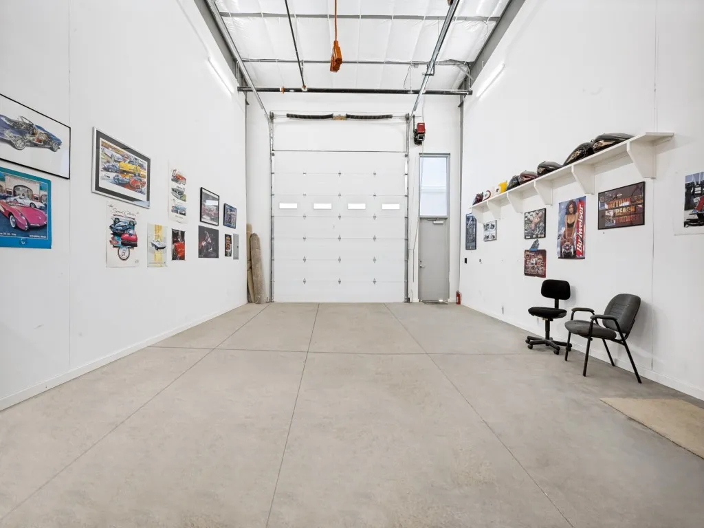 Spacious interior with high ceilings and concrete flooring