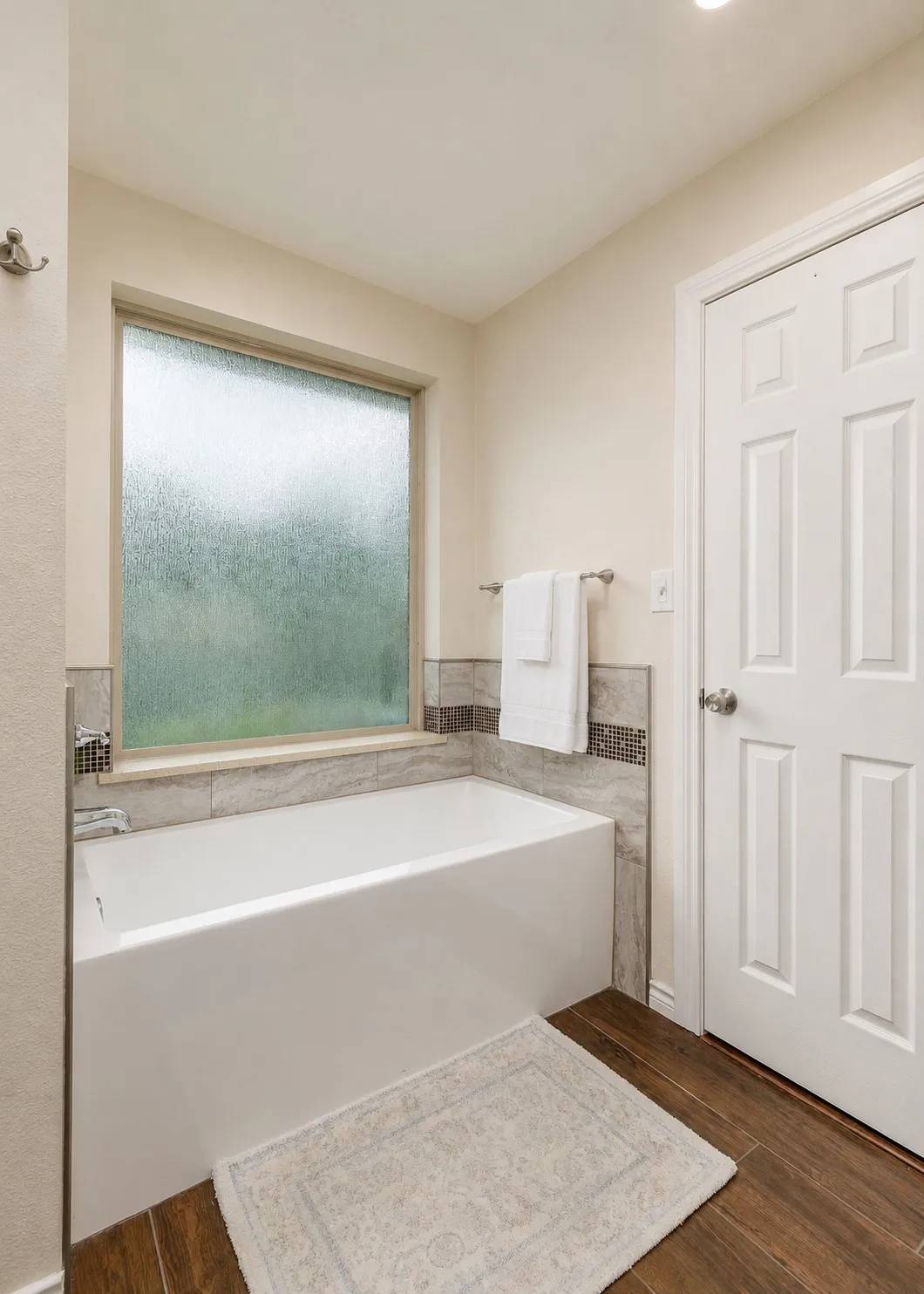 main level primary bedroom bath