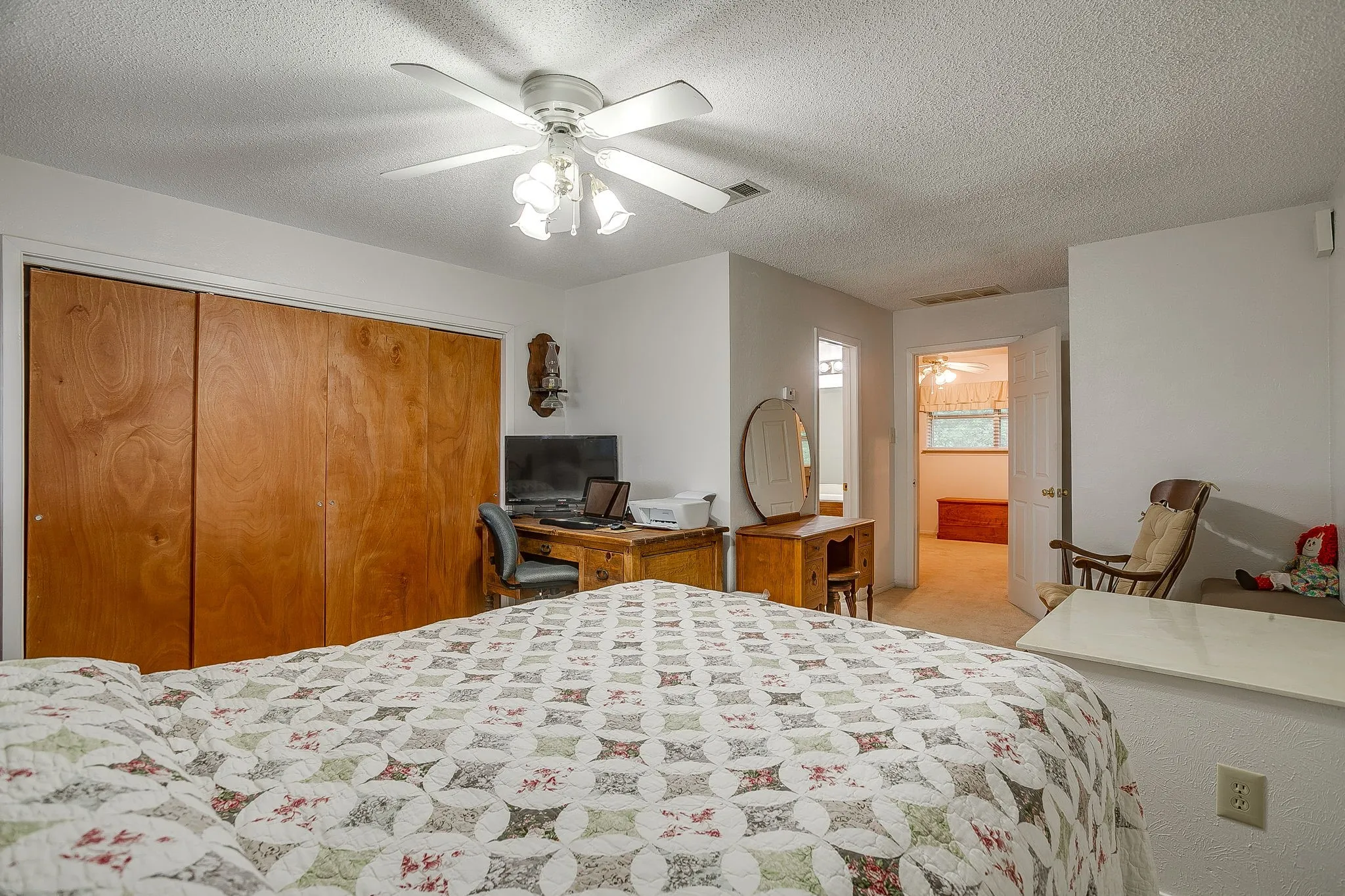 Master bedroom with view of sitting room