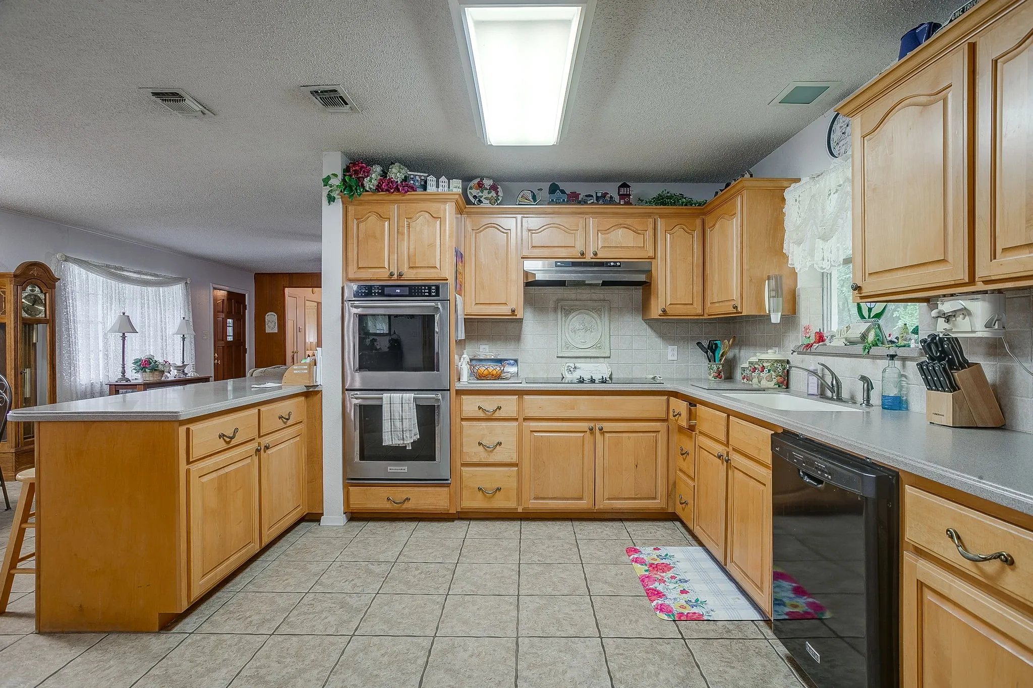 Notice the abundant counter space and double ovens