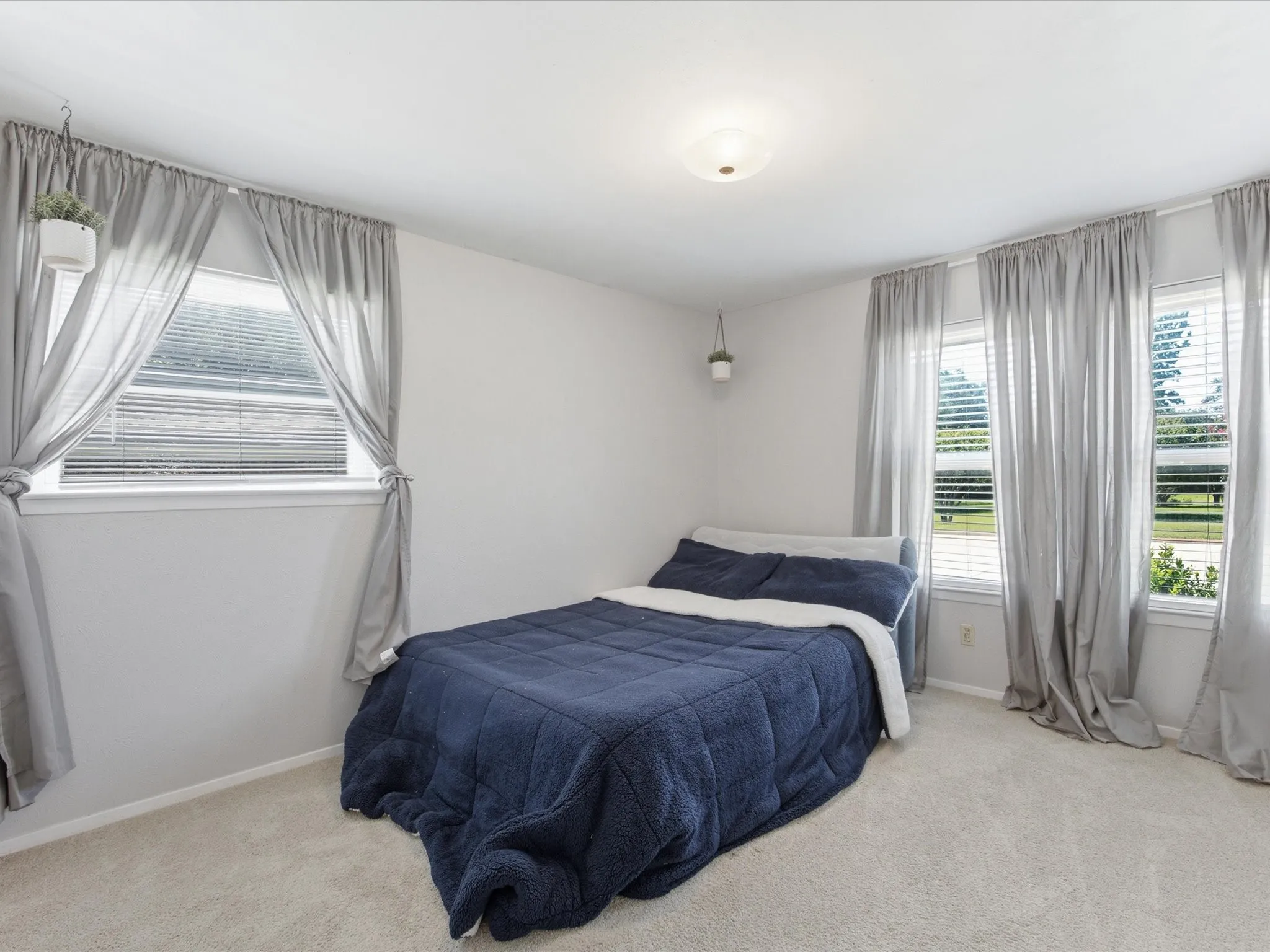 Neutral wall color with carpeting throughout
