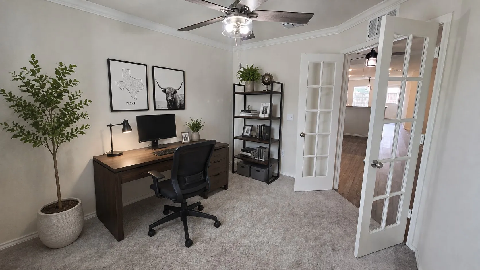 Virtual furnishings. French doors with glass panels open to a dedicated space featuring light gray carpeting, crown molding, and a ceiling fan with integrated lighting