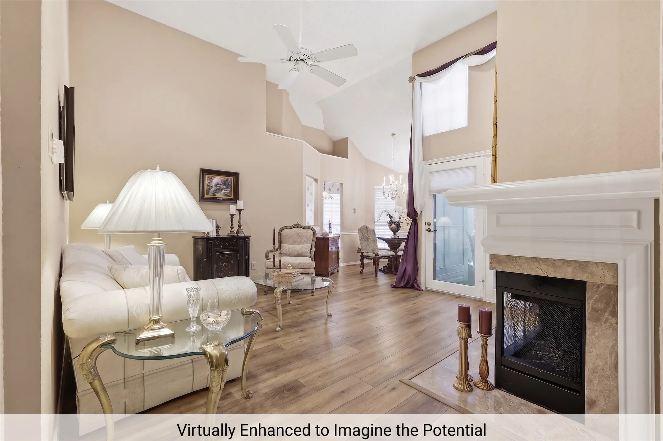 Vaulted ceilings, wood-finish flooring, and a fireplace with a mantel