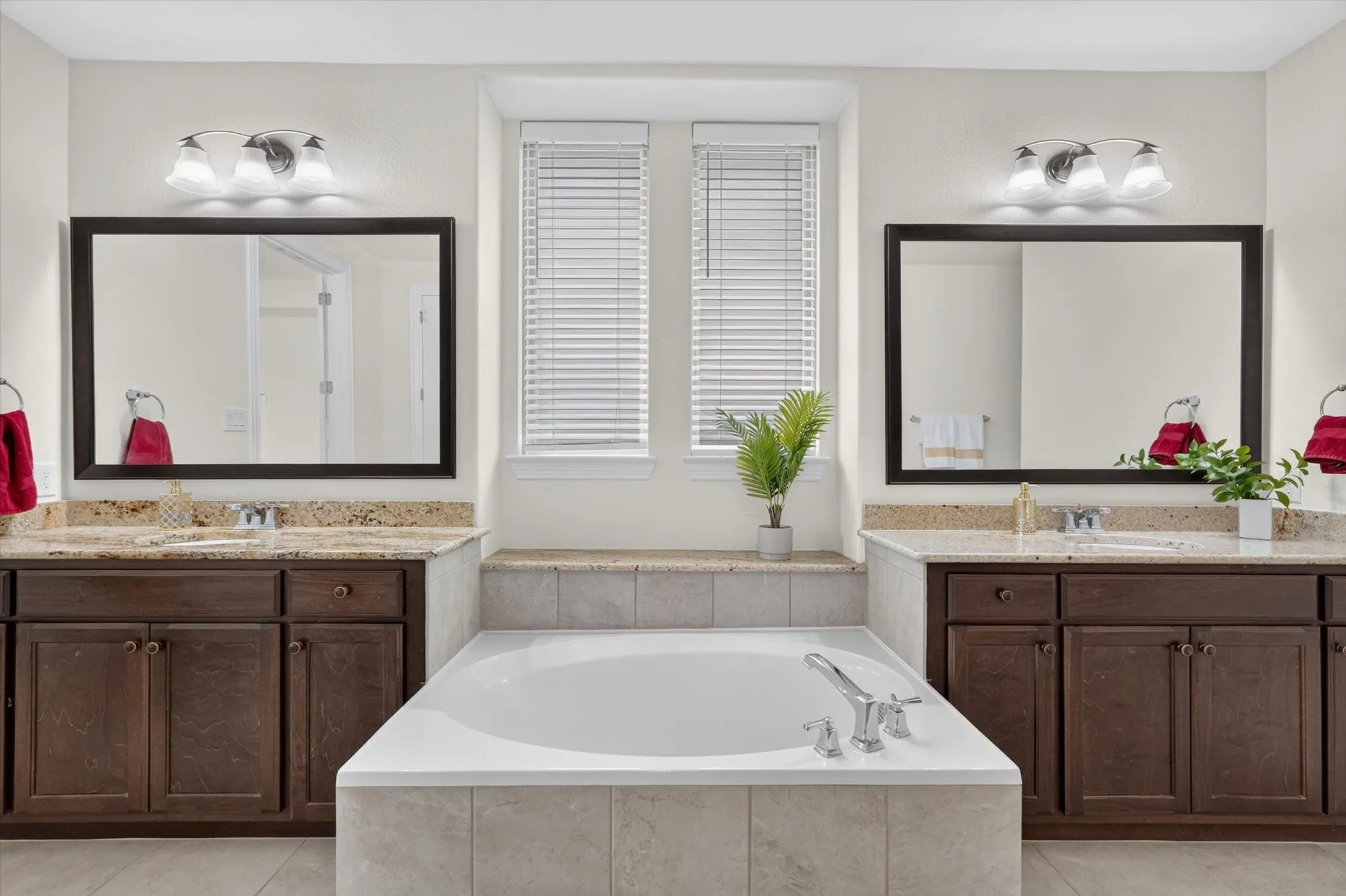Dual sinks with large soaking tub