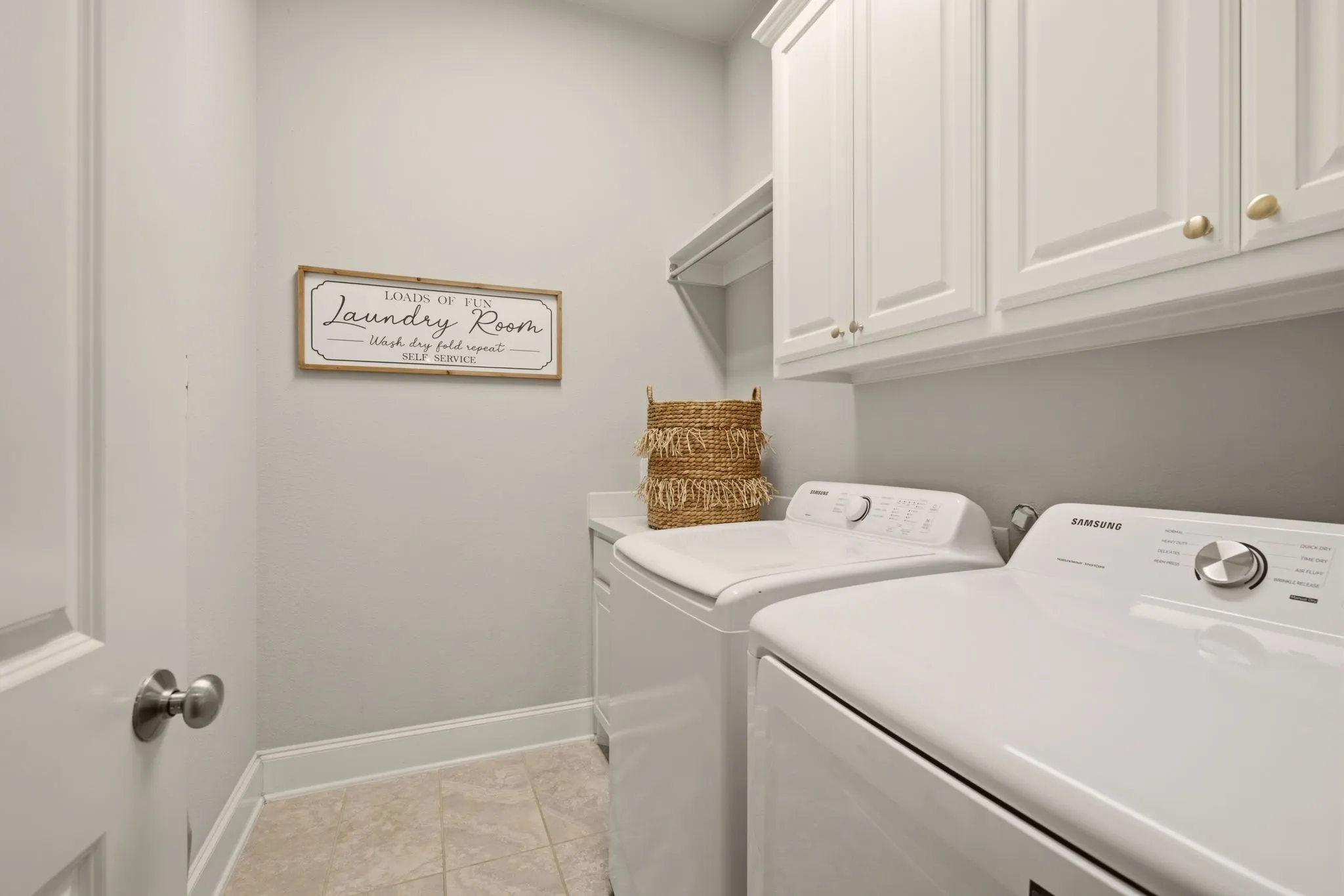 Just bring your own washer & dryer to this separate utility room near the mud room & garages. Plumbed for a future sink if desired.