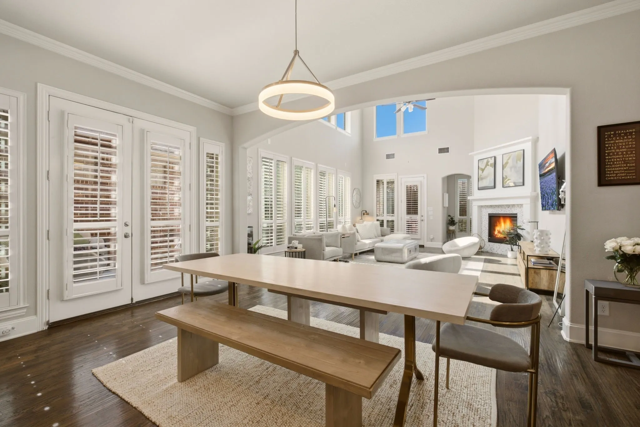 Bright casual dining space with plantation shutters—perfectly polished yet comfortably inviting. The vast dimension allows for any table shape or width for hosting a multitude of guests.