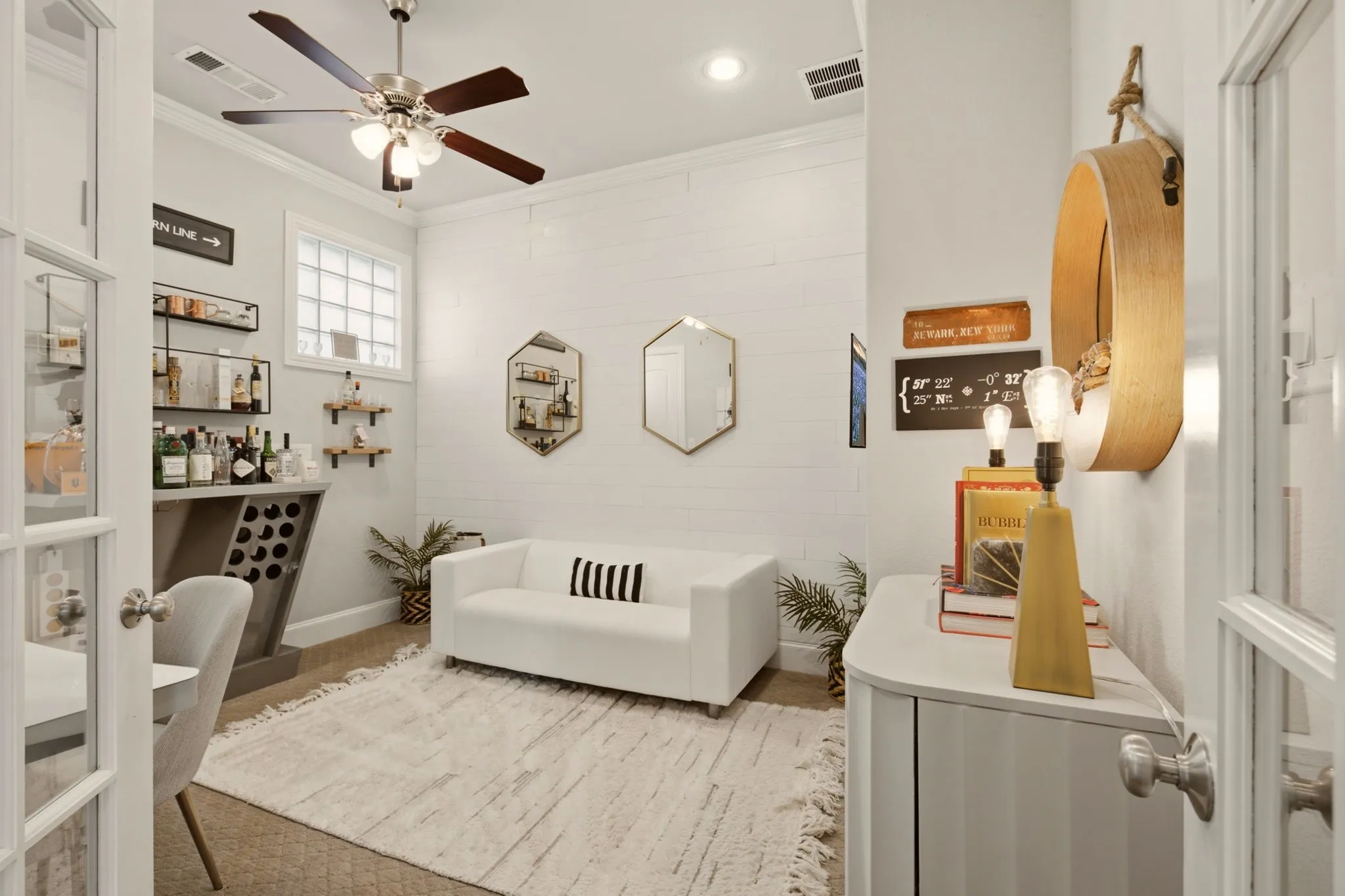 For those who work from home, this versatile office-2nd bedroom/nursery-playroom-beverage lounge is an absolute gem! To the left of the desk...a corner closet for storage.