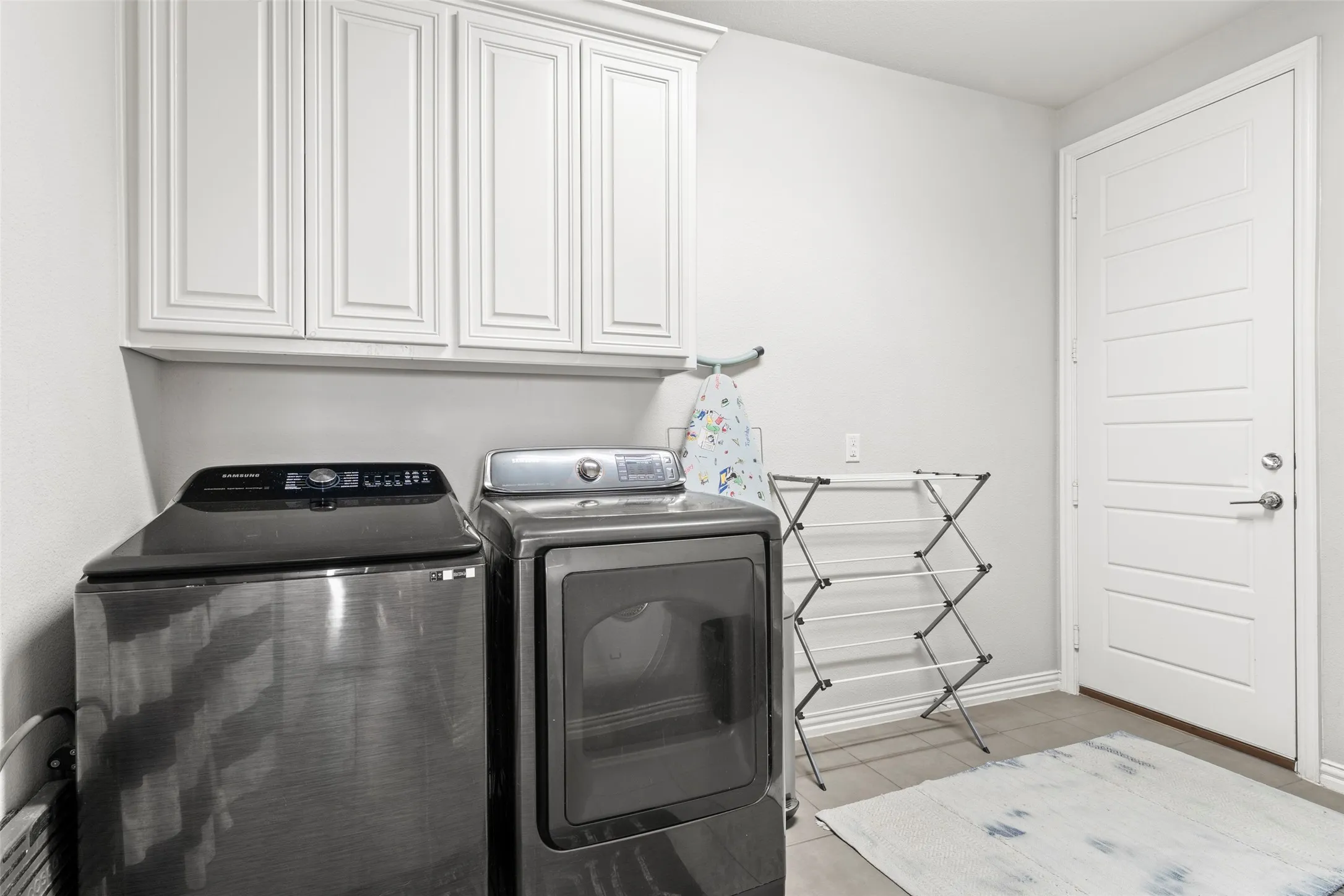 Large laundry room with extra storage