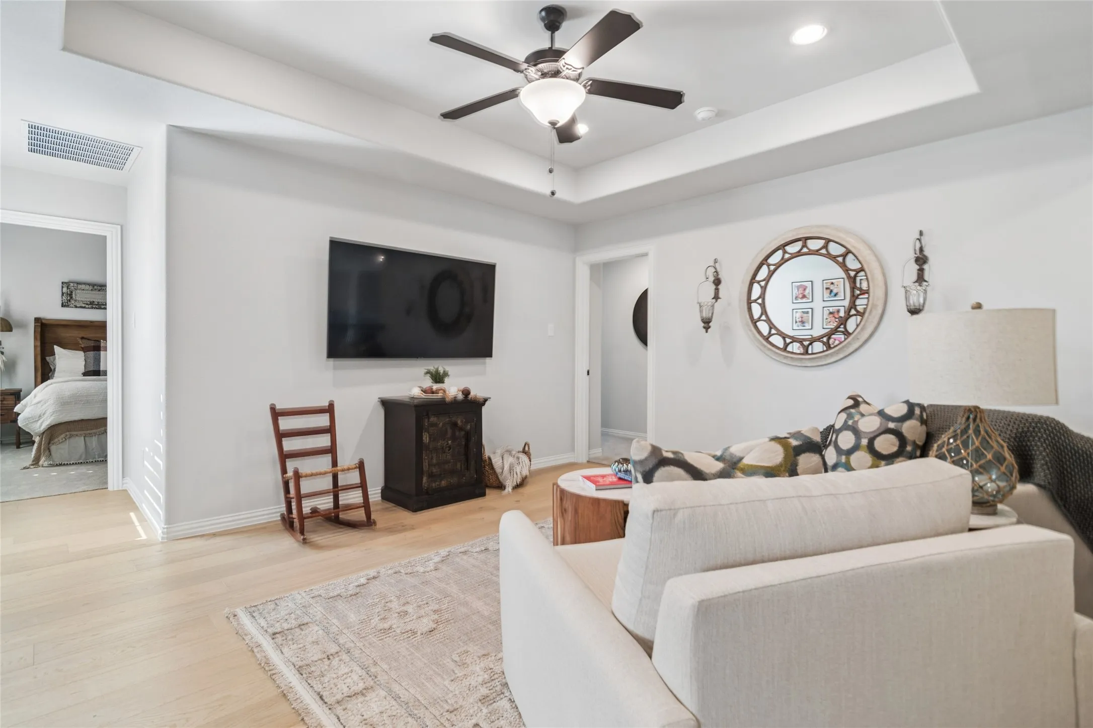 Game room, study area, a great space for anything the new owner would like, this area sits between the 3 bedrooms. Tray ceiling, hardwood flooring.