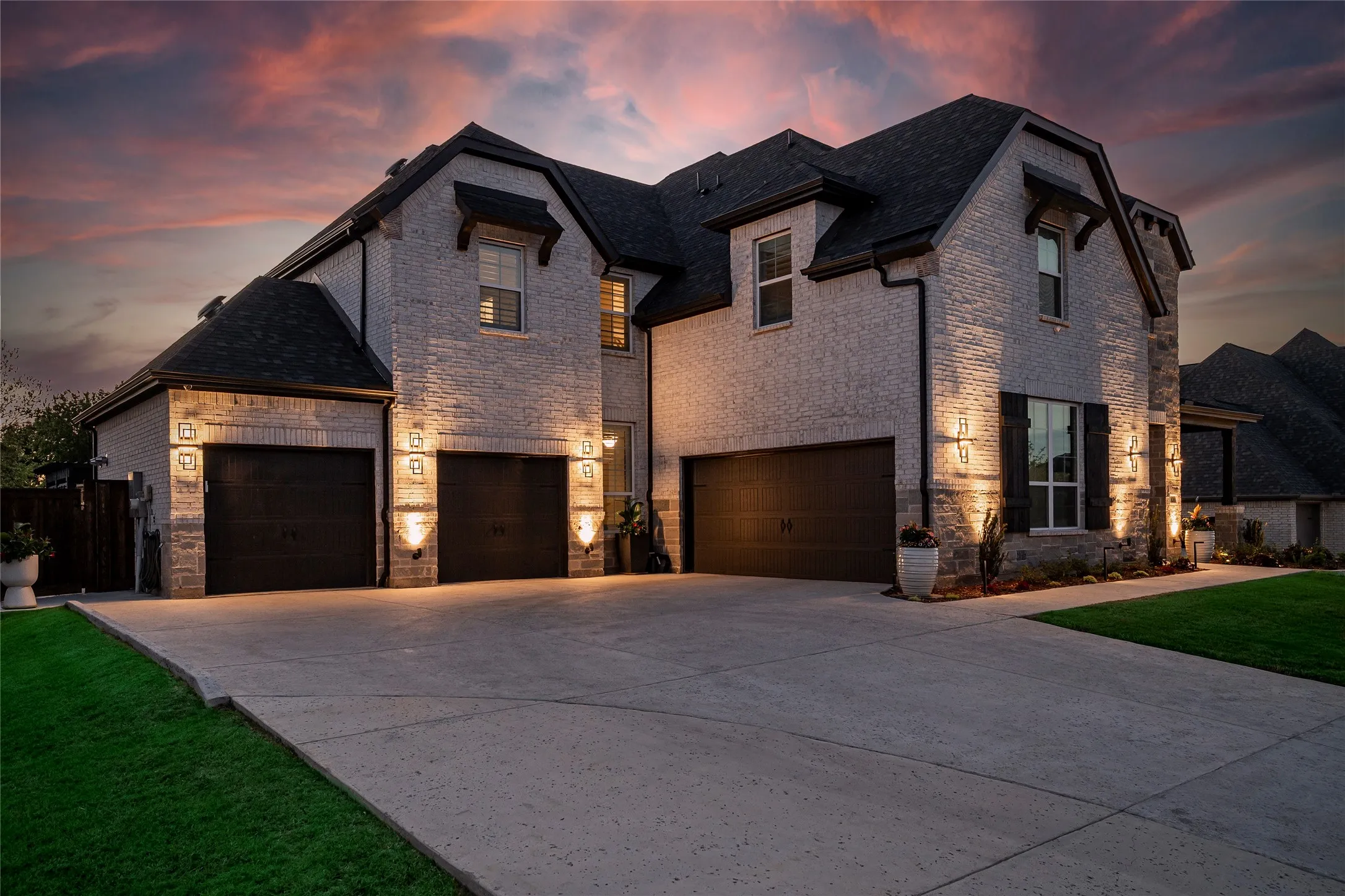Oversized garage pad for ease of entering garages and extra parking.