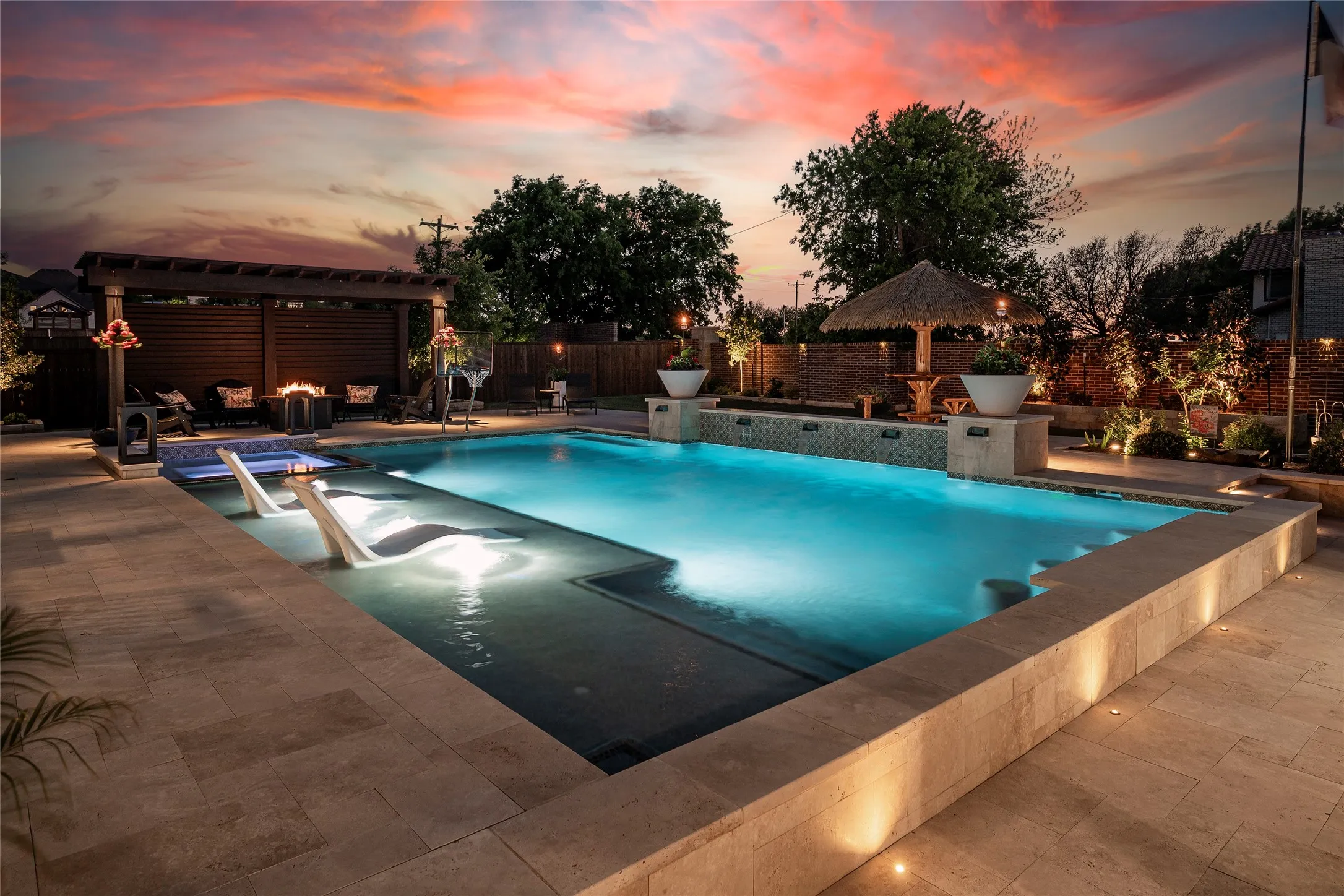 Lots of custom lighting makes for dramatic evenings around the pool.
