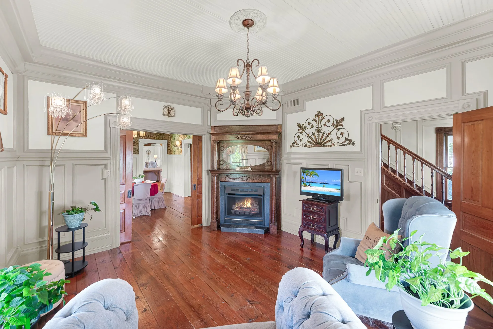 Original Victorian character lives on through the carefully recreated moldings, trim, and woodwork found throughout this elegant gathering space. Everyday moments feel a little more meaningful in a room designed for slowing down and connecting.