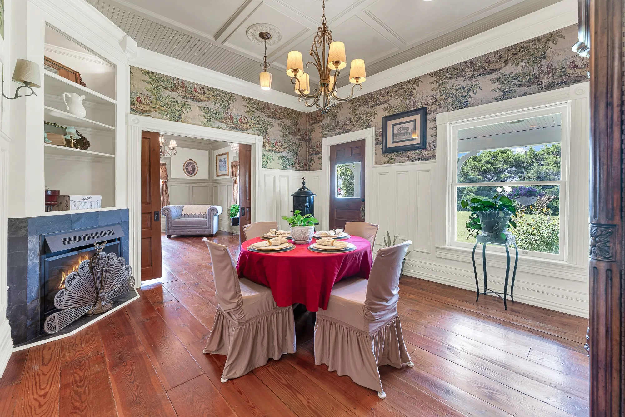 Detailed millwork, oversized windows, and carefully recreated Victorian craftsmanship give the dining room a warm, timeless elegance. Holiday celebrations, family dinners, and milestone moments all feel right at home here.
