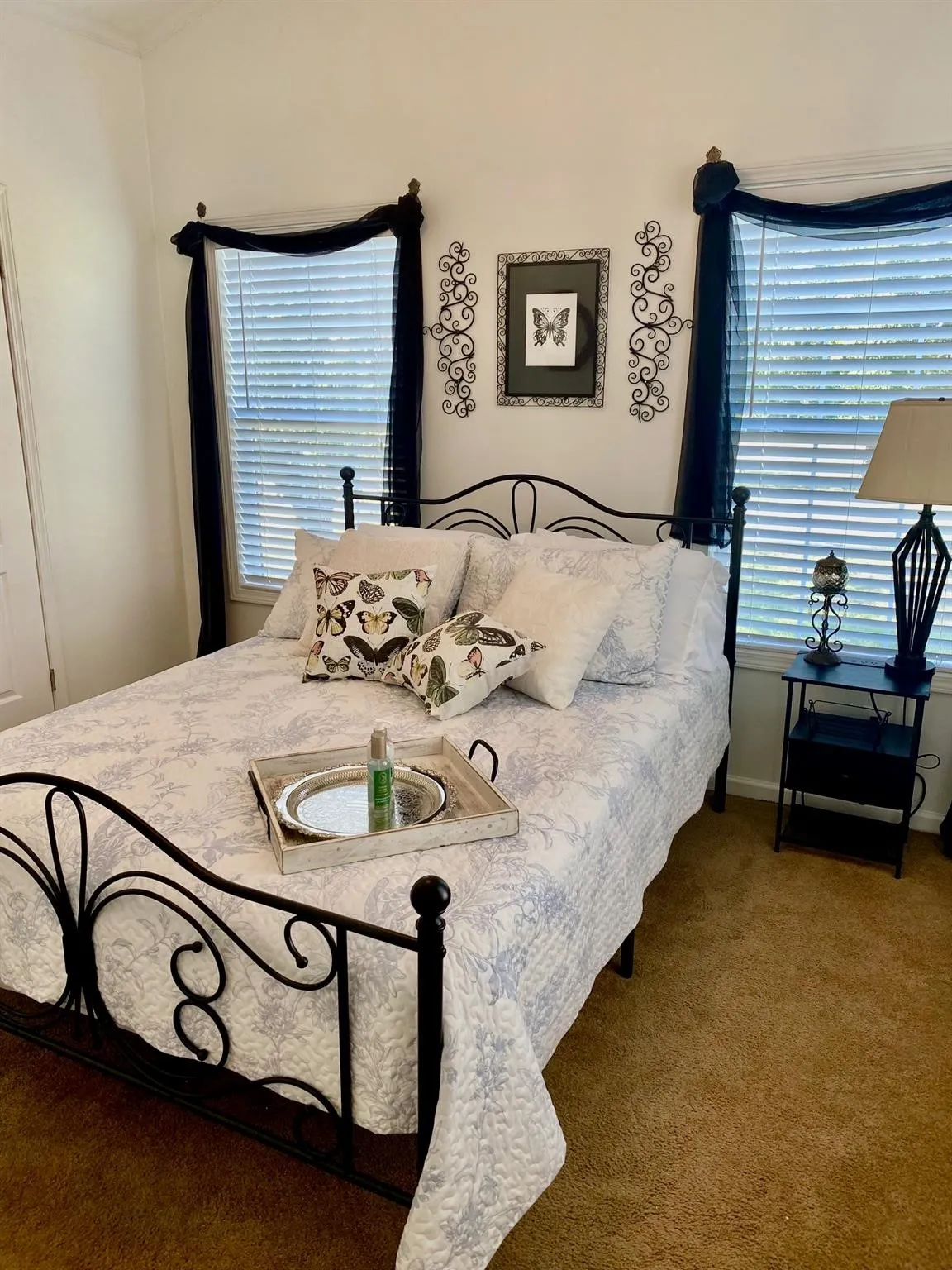 Cottages A & B - Large windows fill the bedroom with natural light, creating a peaceful retreat that's comfortable and private. This relaxing atmosphere adds to the appeal for tenants, making these cottages an attractive addition to the property's established rental income.