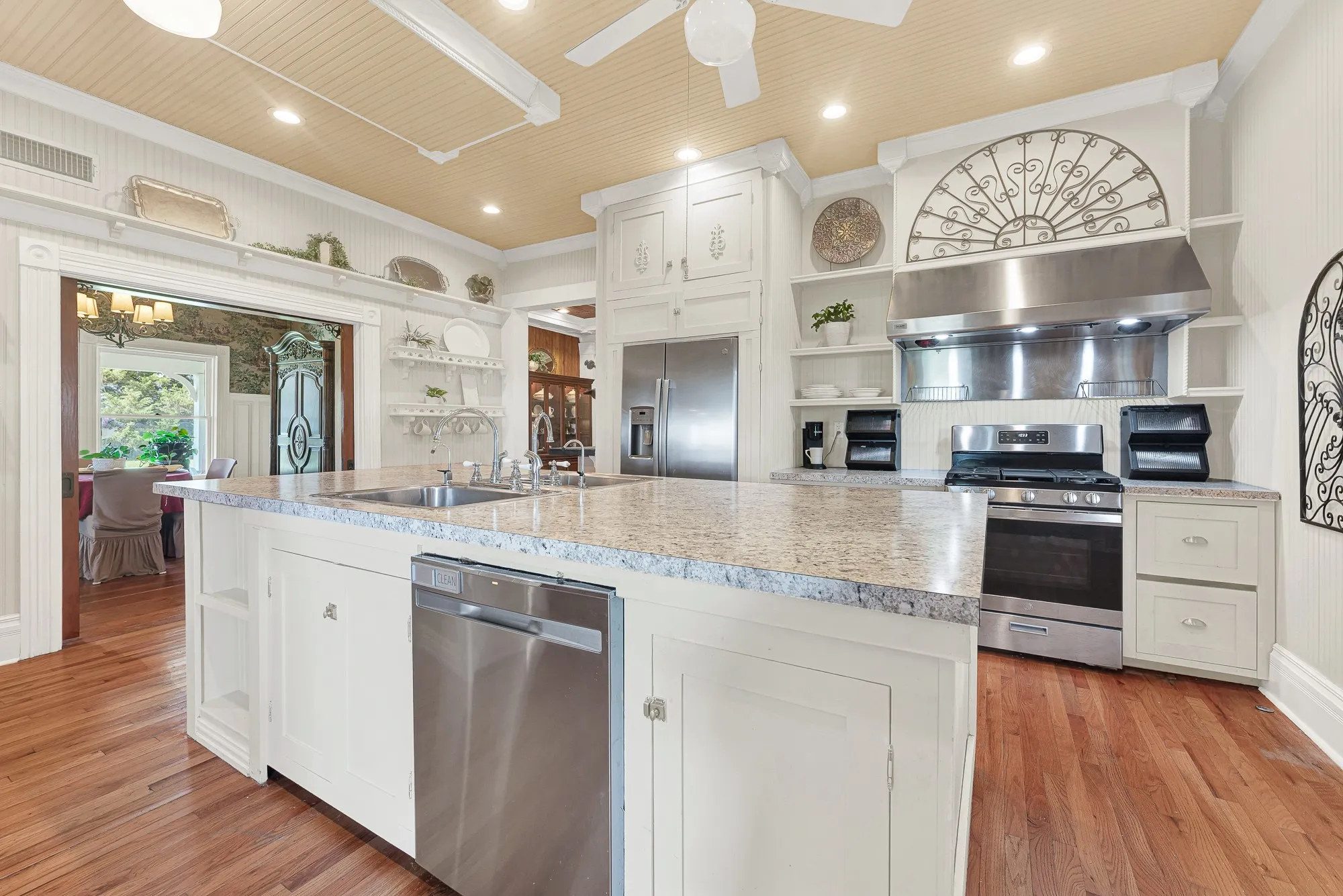Step inside through the everyday entrance, where modern kitchen updates blend beautifully with the timeless Victorian character that makes this home so welcoming. Imagine family and friends naturally gathering here, lingering over conversations before drifting into the dining room or out to the wraparound porch.