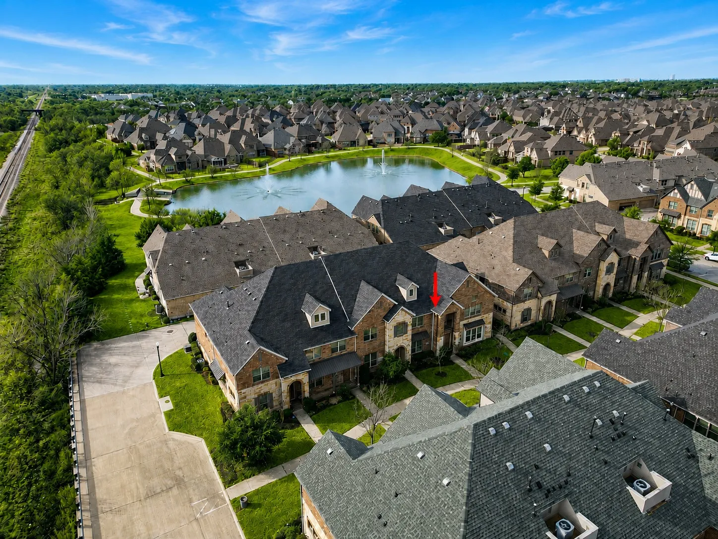 Aerial view with a pond in the background