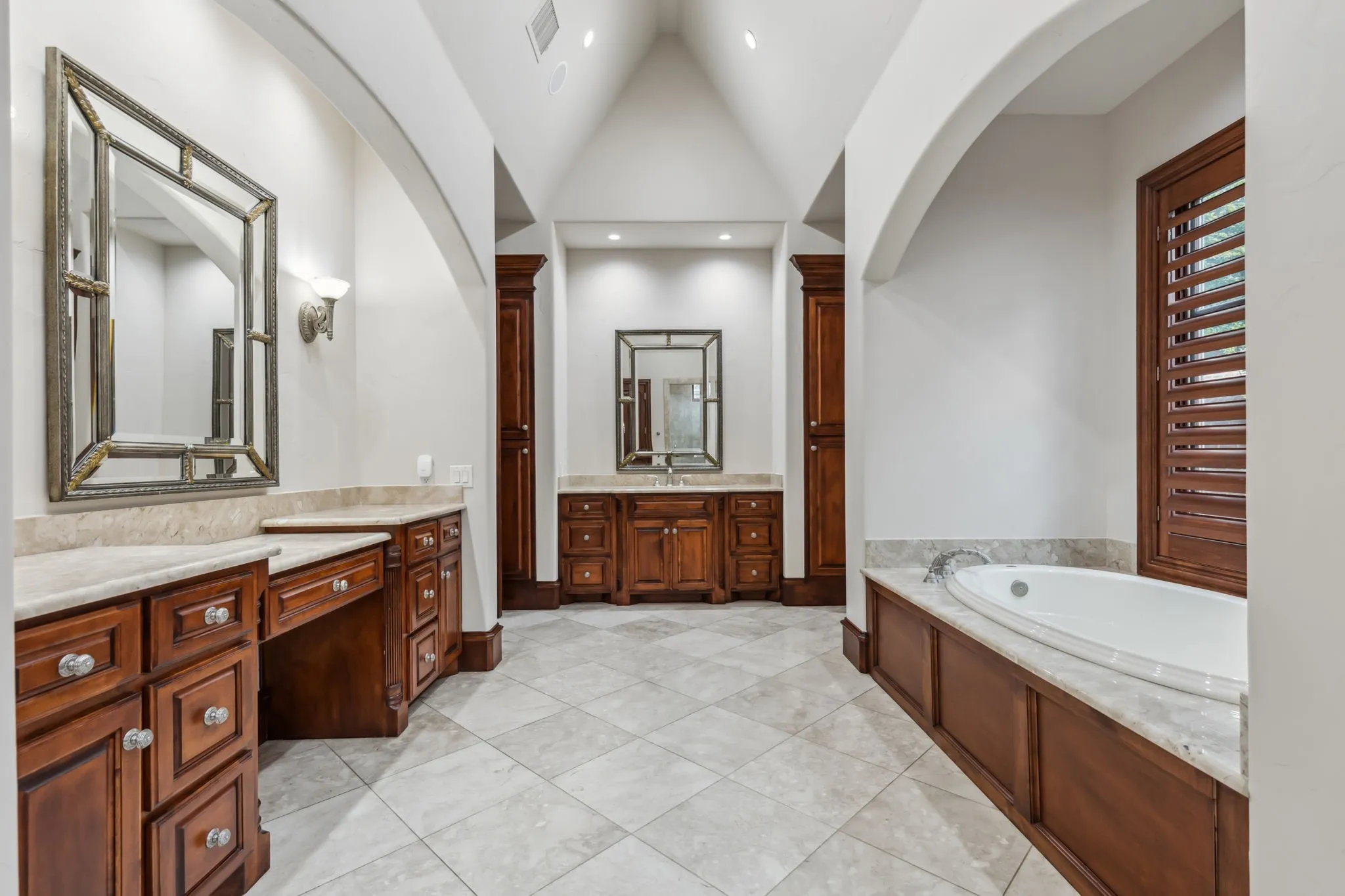 Primary Bathroom offering 3 vanities