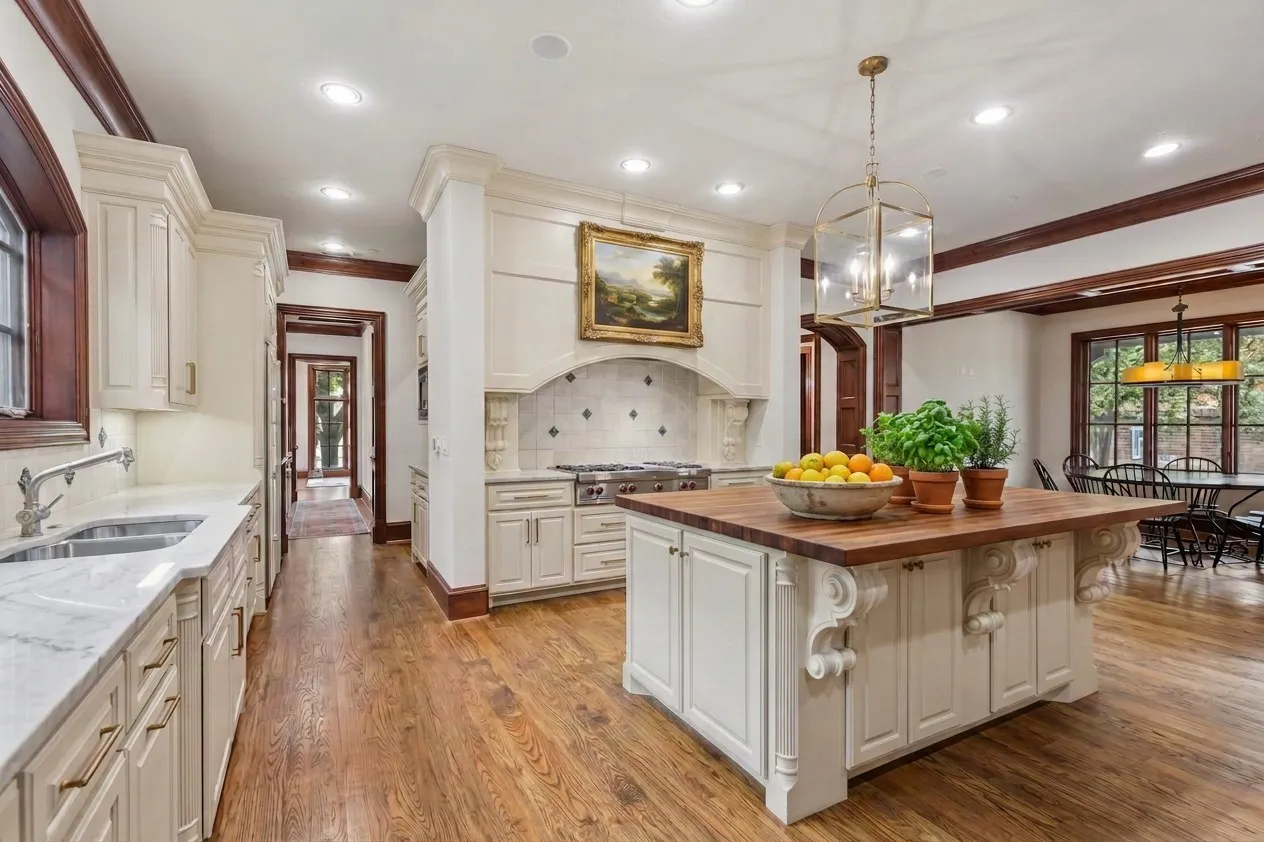 AI PAINTED Kitchen featuring hardwood flooring, white cabinetry, a large kitchen island with a butcher block countertop, a range with a tile backsplash, and stone countertops
