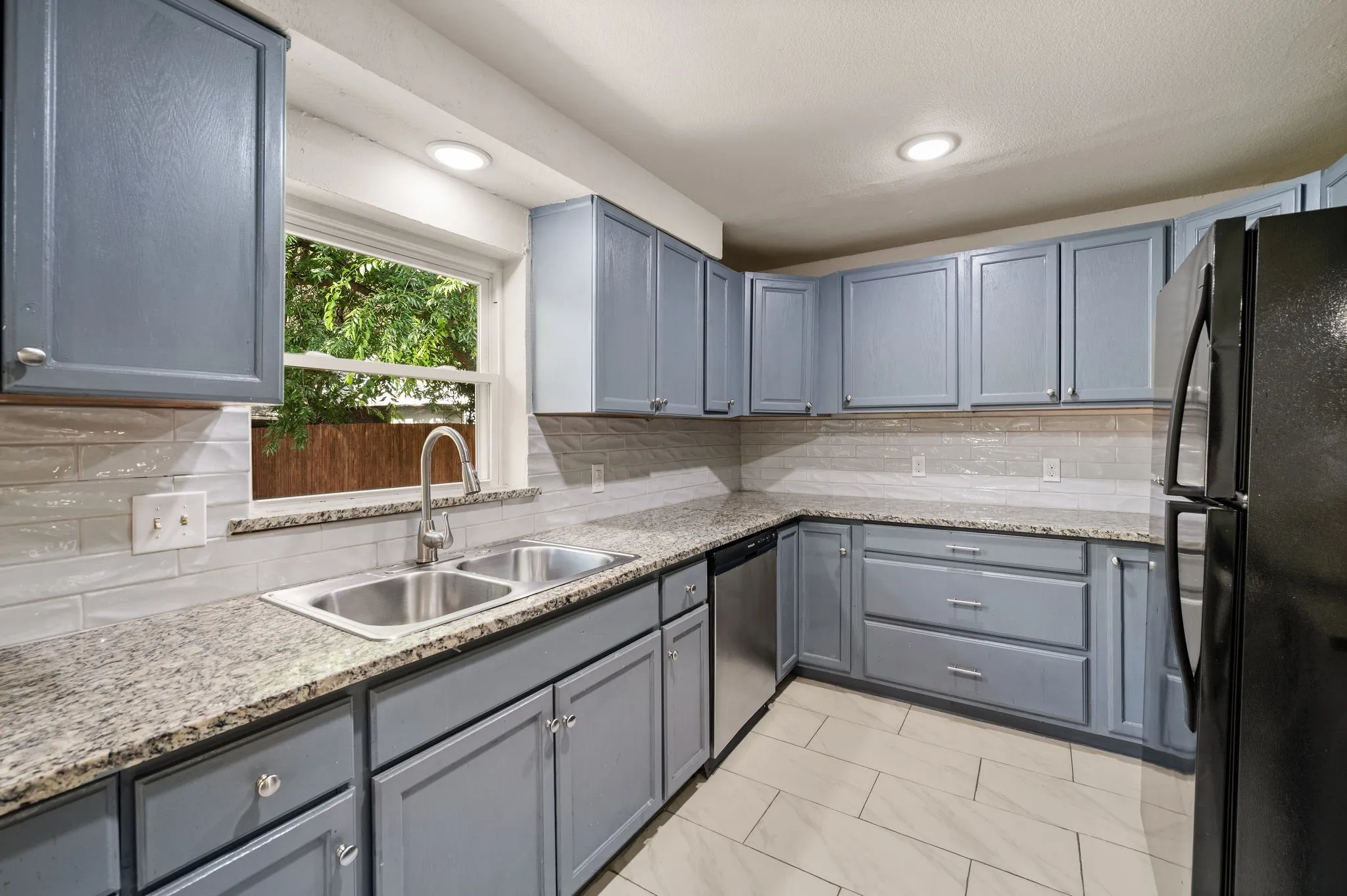 Stainless Frigidaire dishwasher; Refreshed Hardware throughout; Garbage Disposal; Ice maker water line shutoff valve recently updated