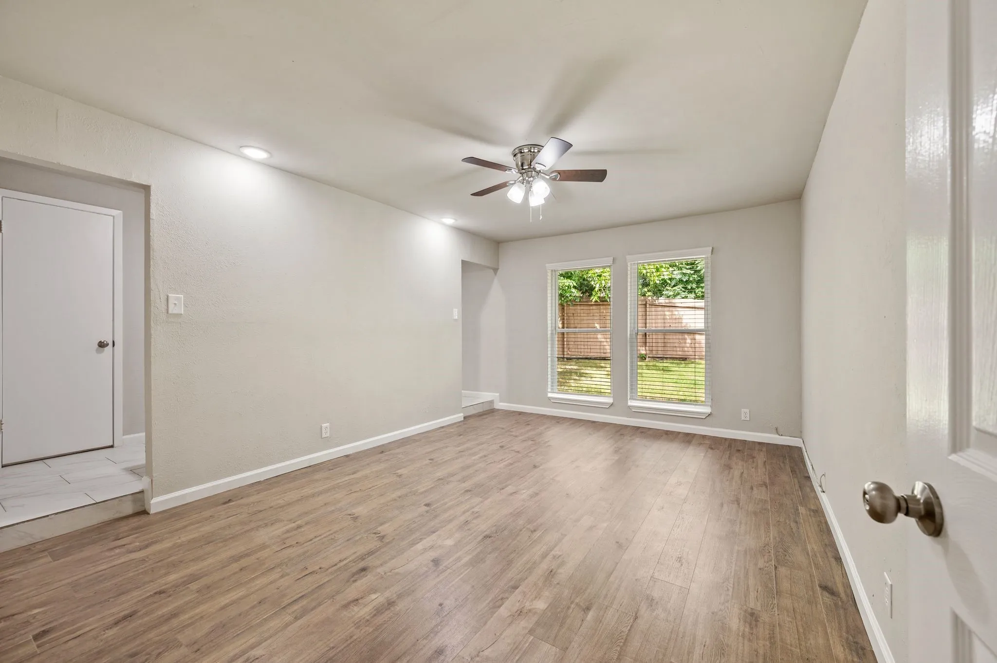 Texas-sized primary suite with room for sitting