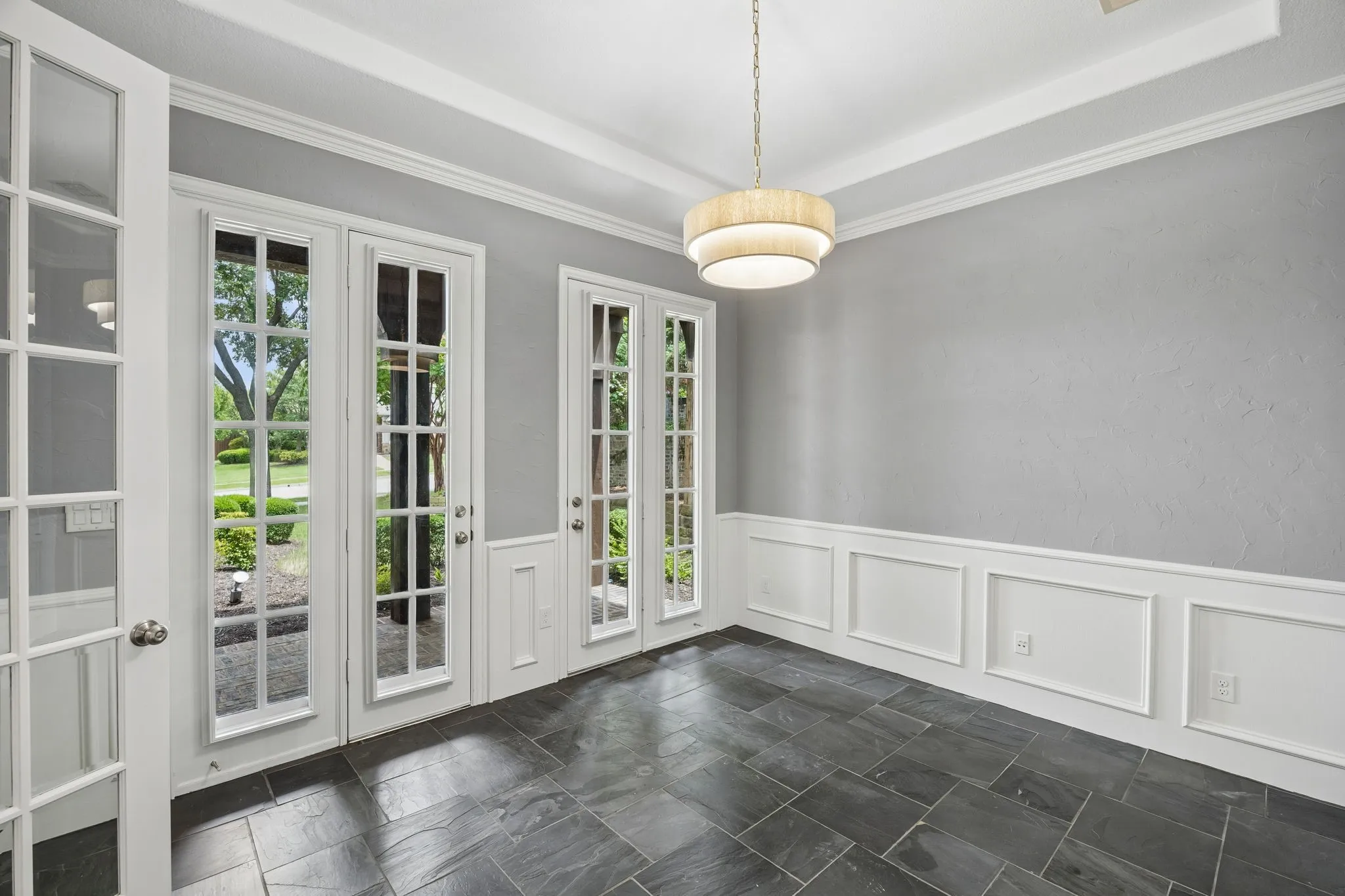 French doors open the study up to the front patio