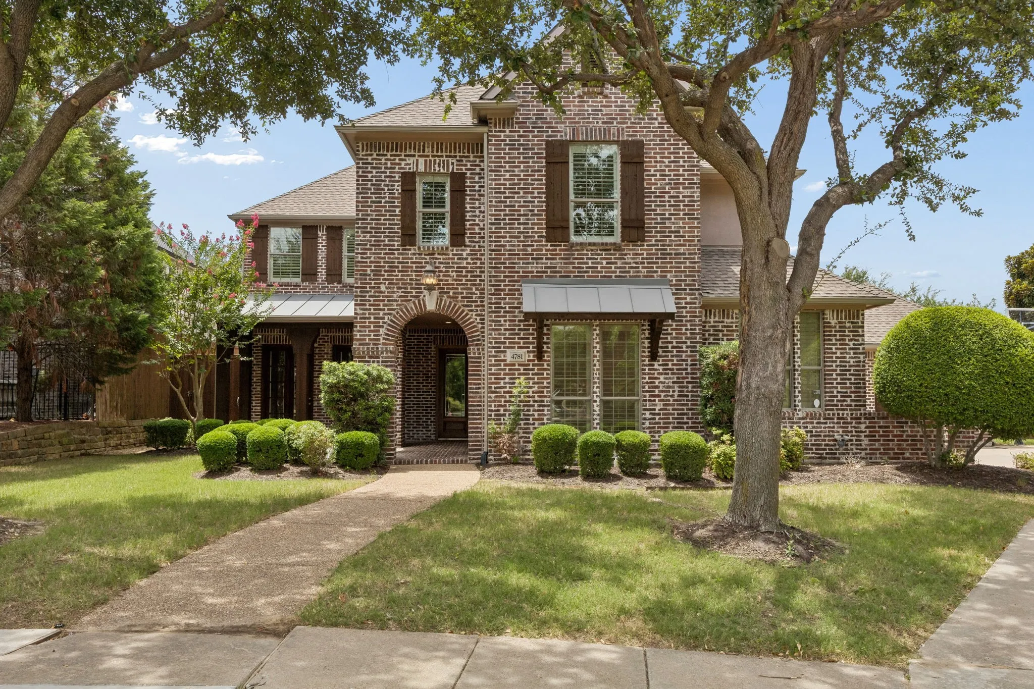 Situated on an exceptional .40 acre lot
