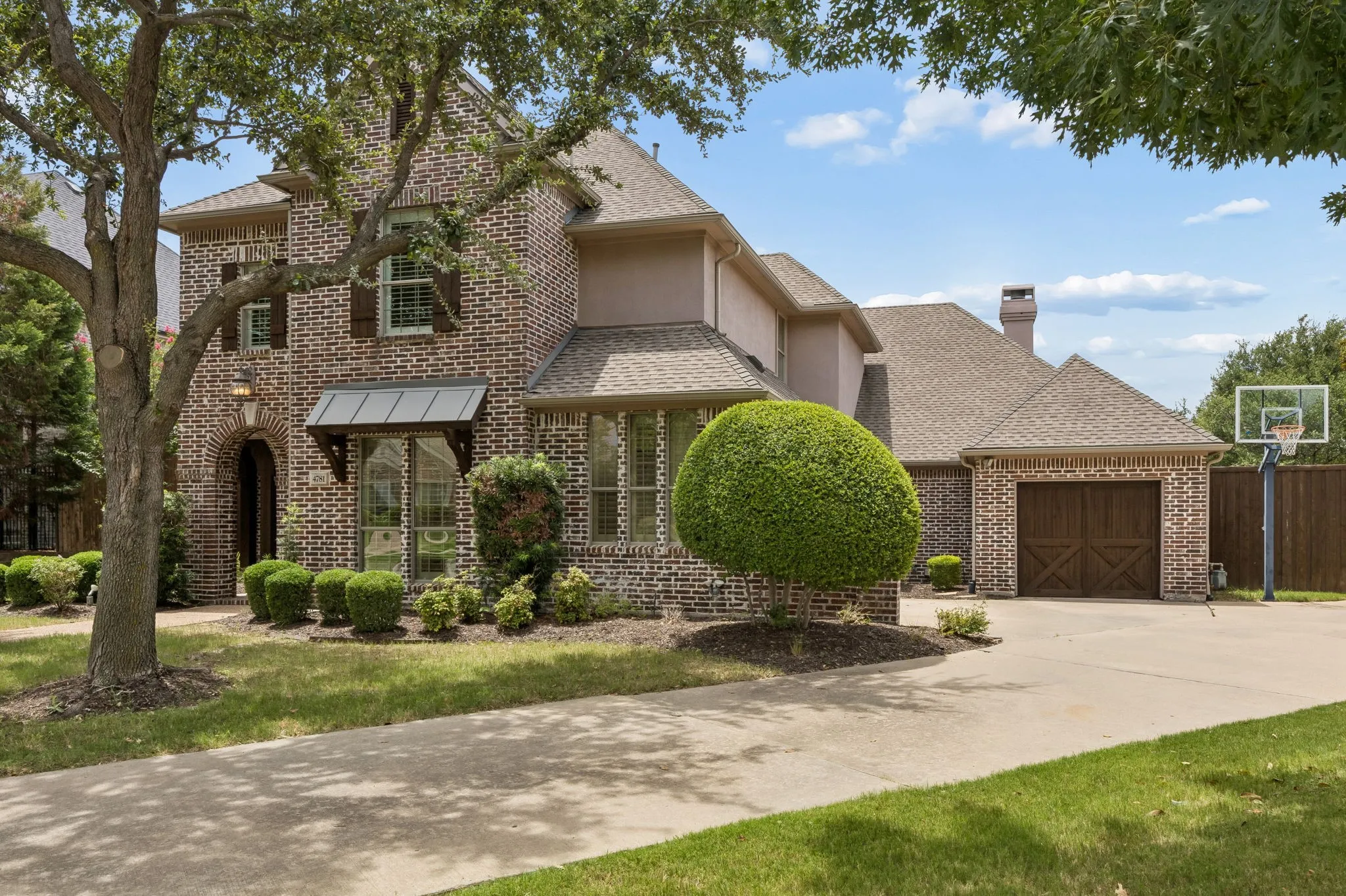 3 car garage, swing driveway, space for basketball play