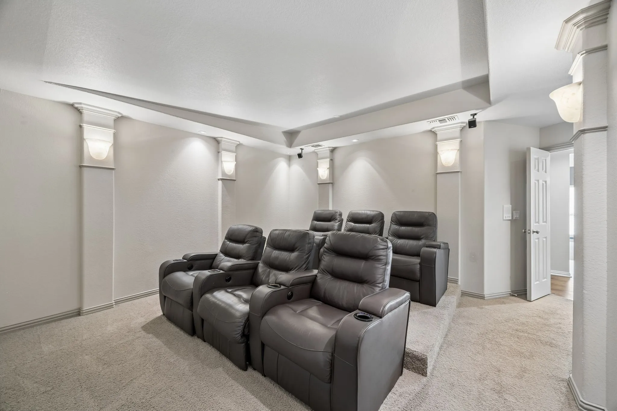 Movie time!  Stadium seating ... the chairs stay with the house.