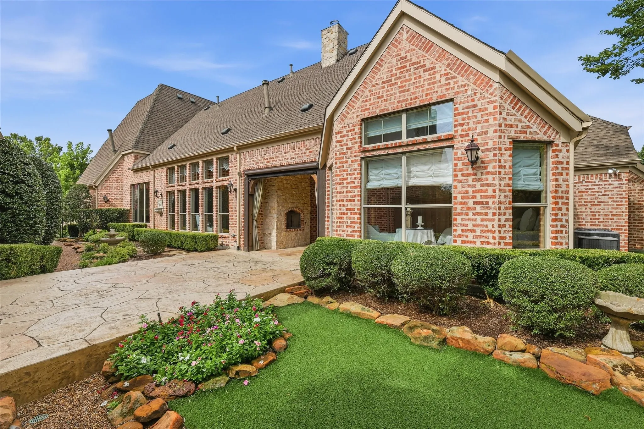 Side yard with a courtyard and large patio