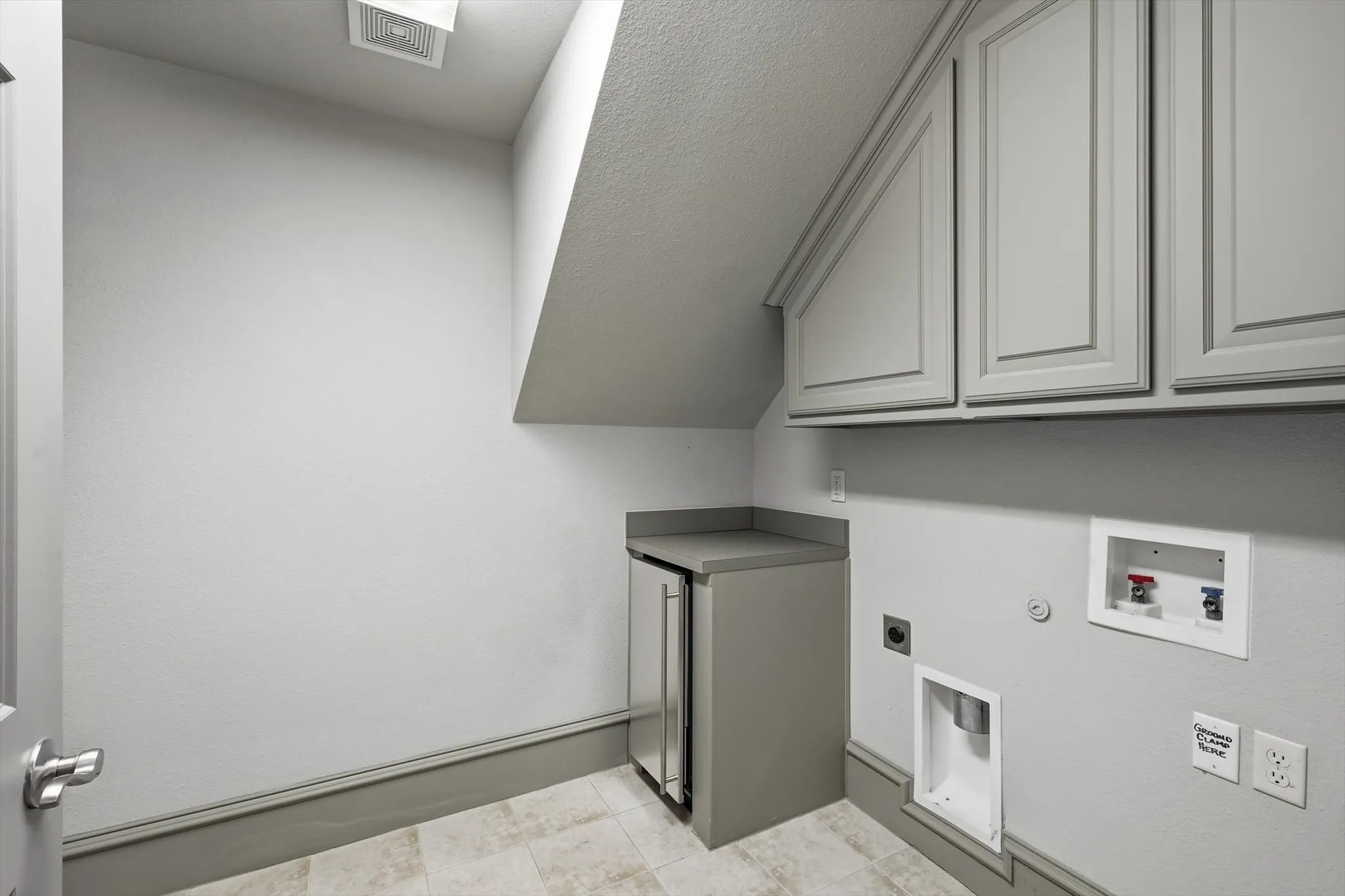Walk-In laundry room just off the kitchen