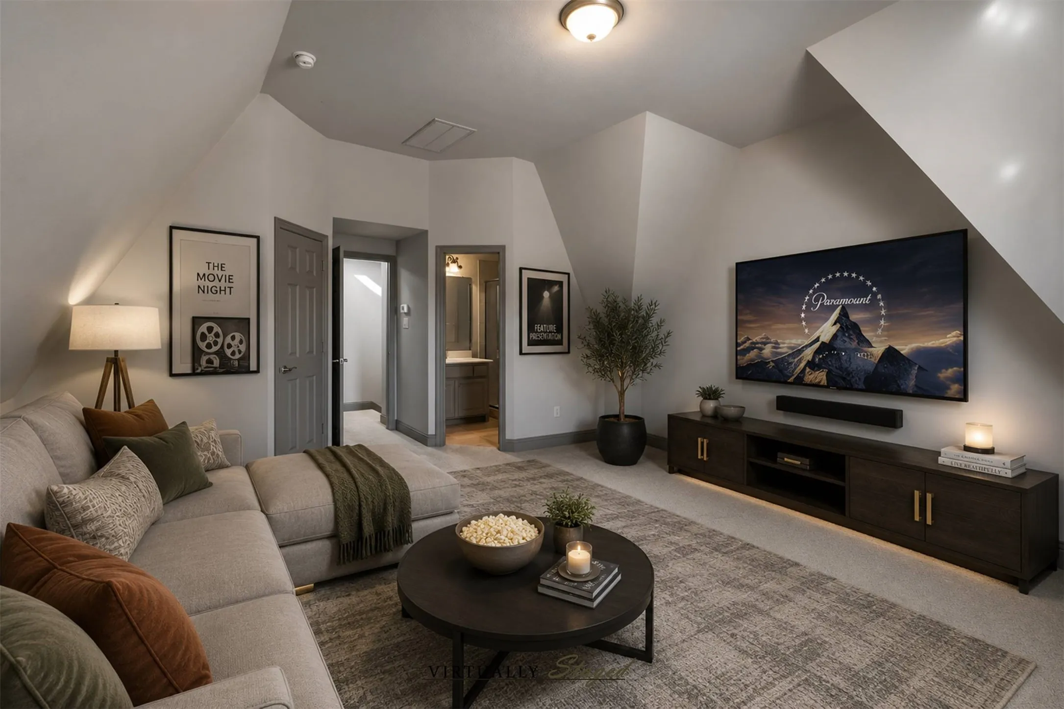 Upstairs space staged as a media room/living space