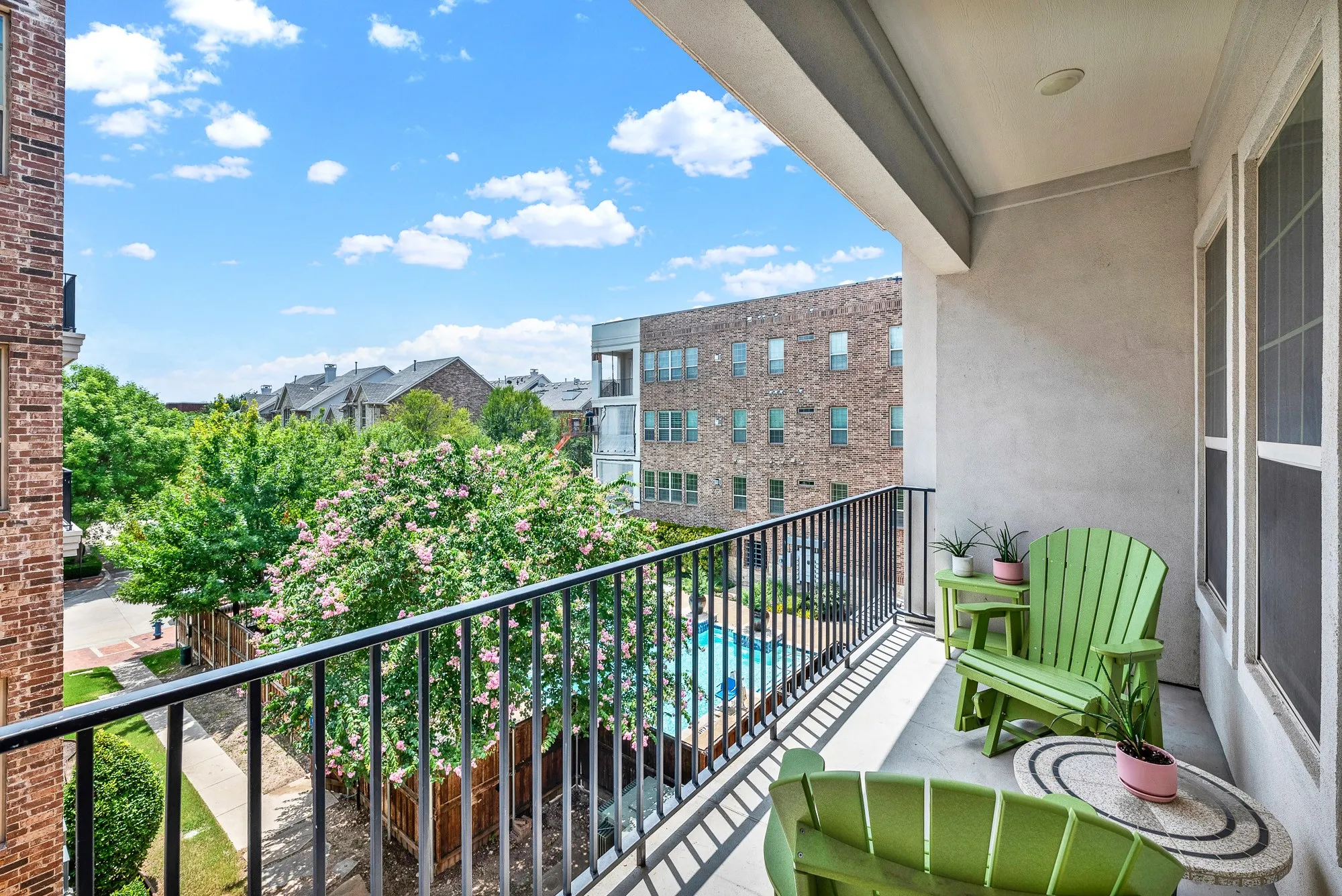 Balcony, overlooking pool. Great place to unwind.