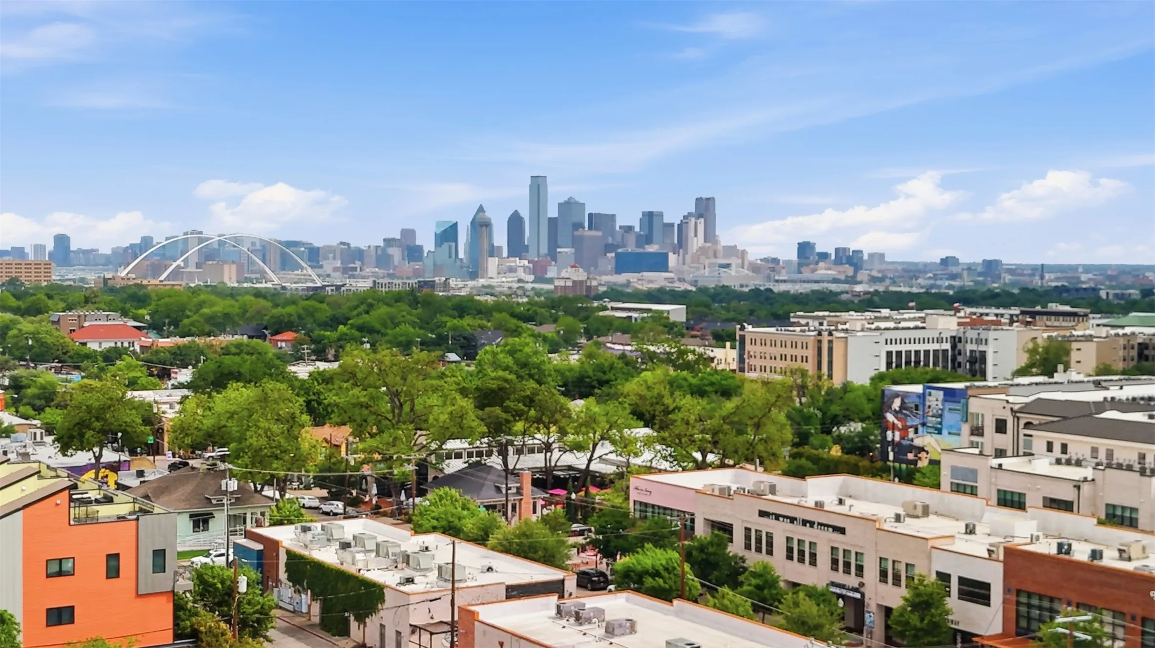 Proximity to downtown Dallas, Bishop Arts, retail, restaurants, lush green tree canopy, and architectural diversity