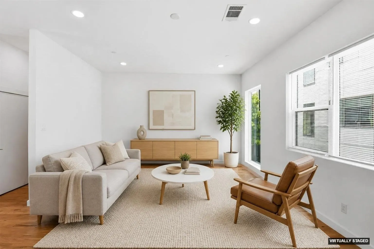 Light-filled living room offers ample space for entertaining.