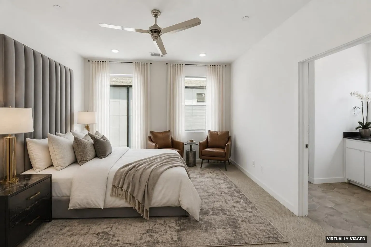 Primary bedroom features en-suite bath and large walk-in closet.
