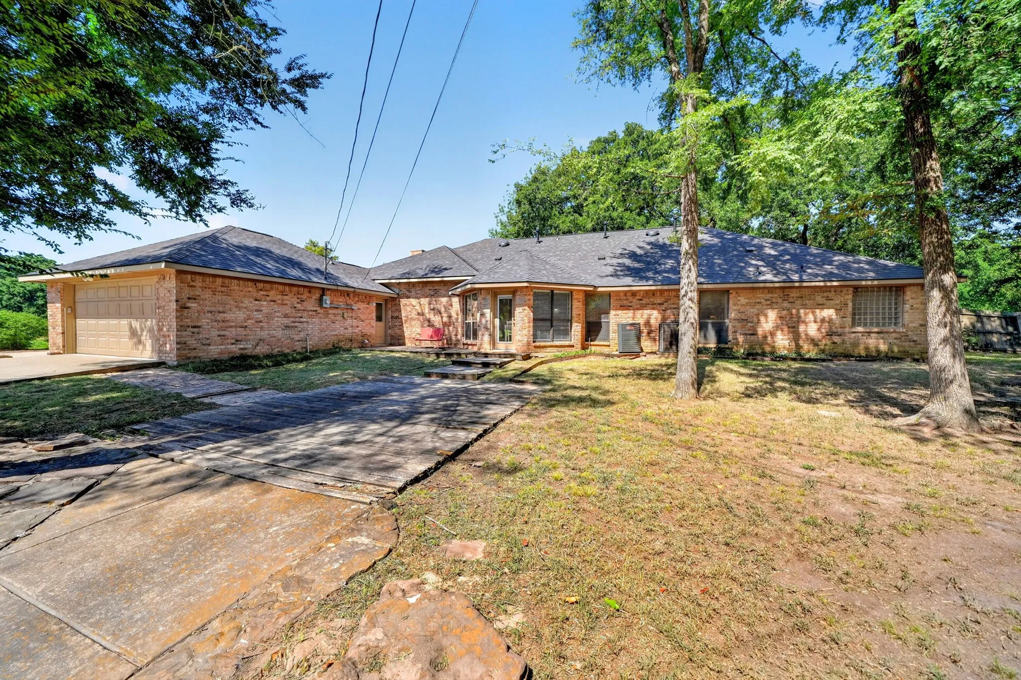 Back of the house with attached garage.
